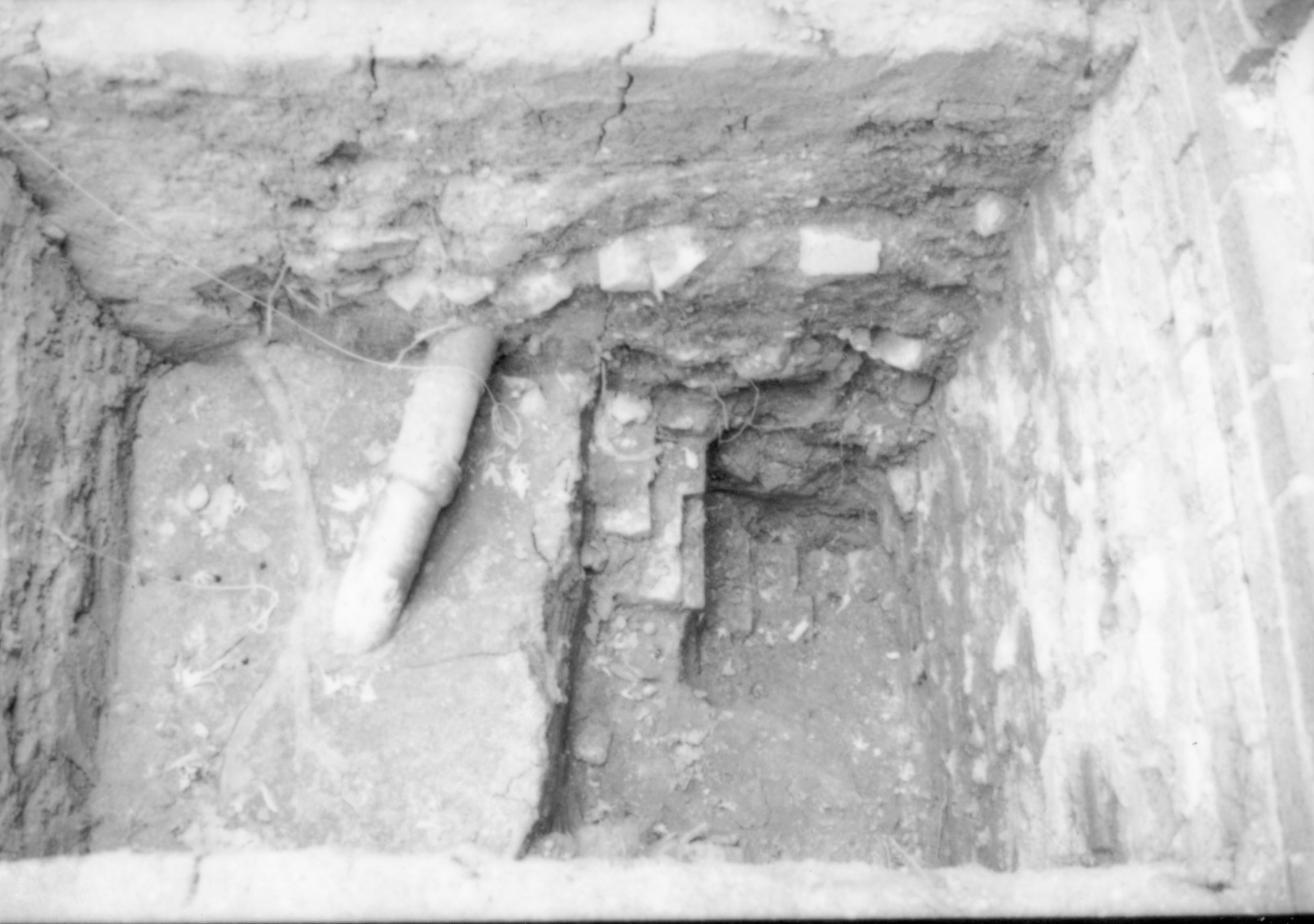 East- Archeological excavation under south porch Lincoln Home NHS, CRS Collections Move, Arnold Barn Foundations, Roll N16, exp 25 Dubois, cistern, excavation