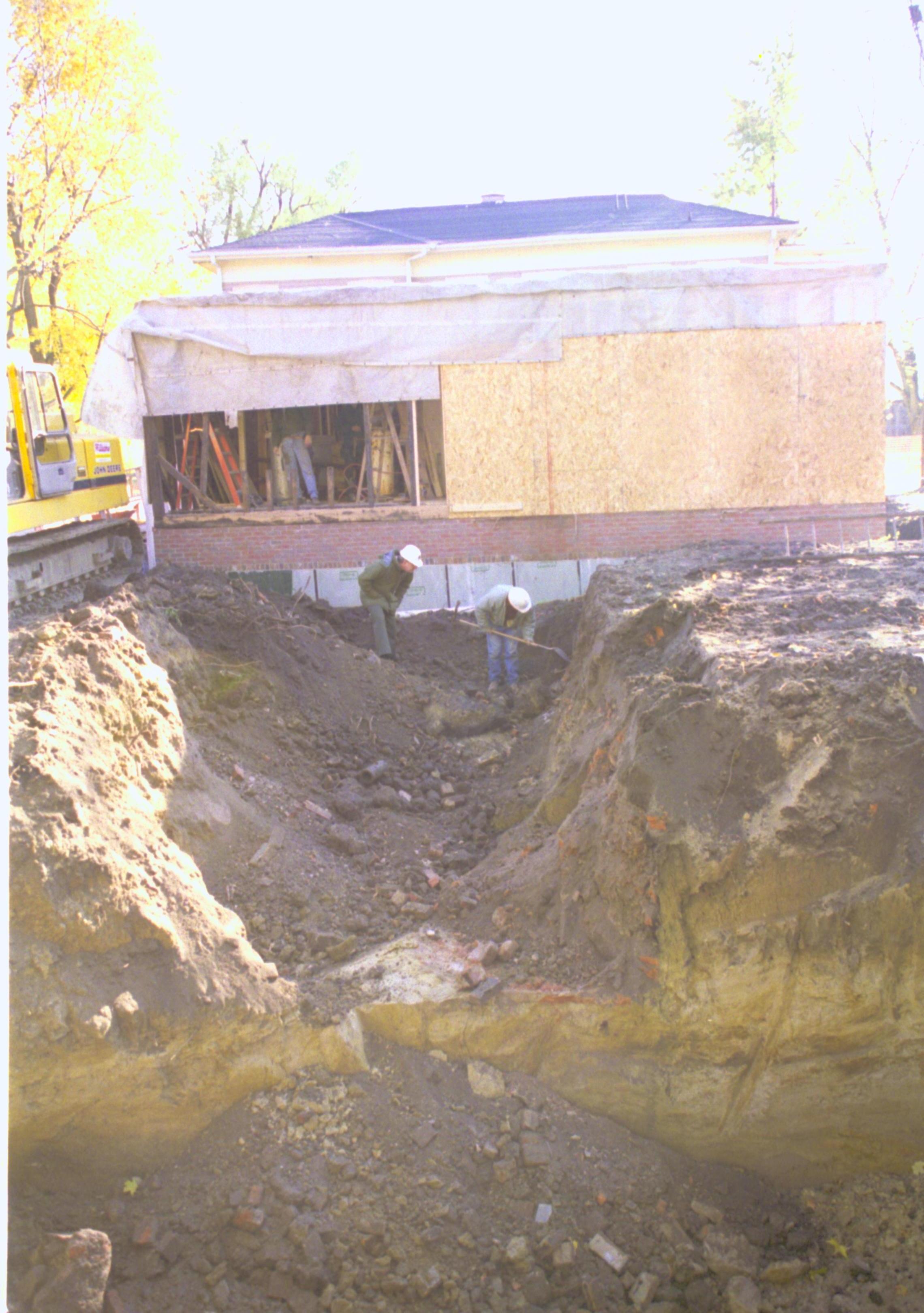 Excavating foundations for Corneau (Blake and Mansberger). North wall Sprigg in background Lincoln Home NHS, Corneau lot facing South, Roll N5, exp 14, sheet 1 of 2 LIHO, Corneau, excavation