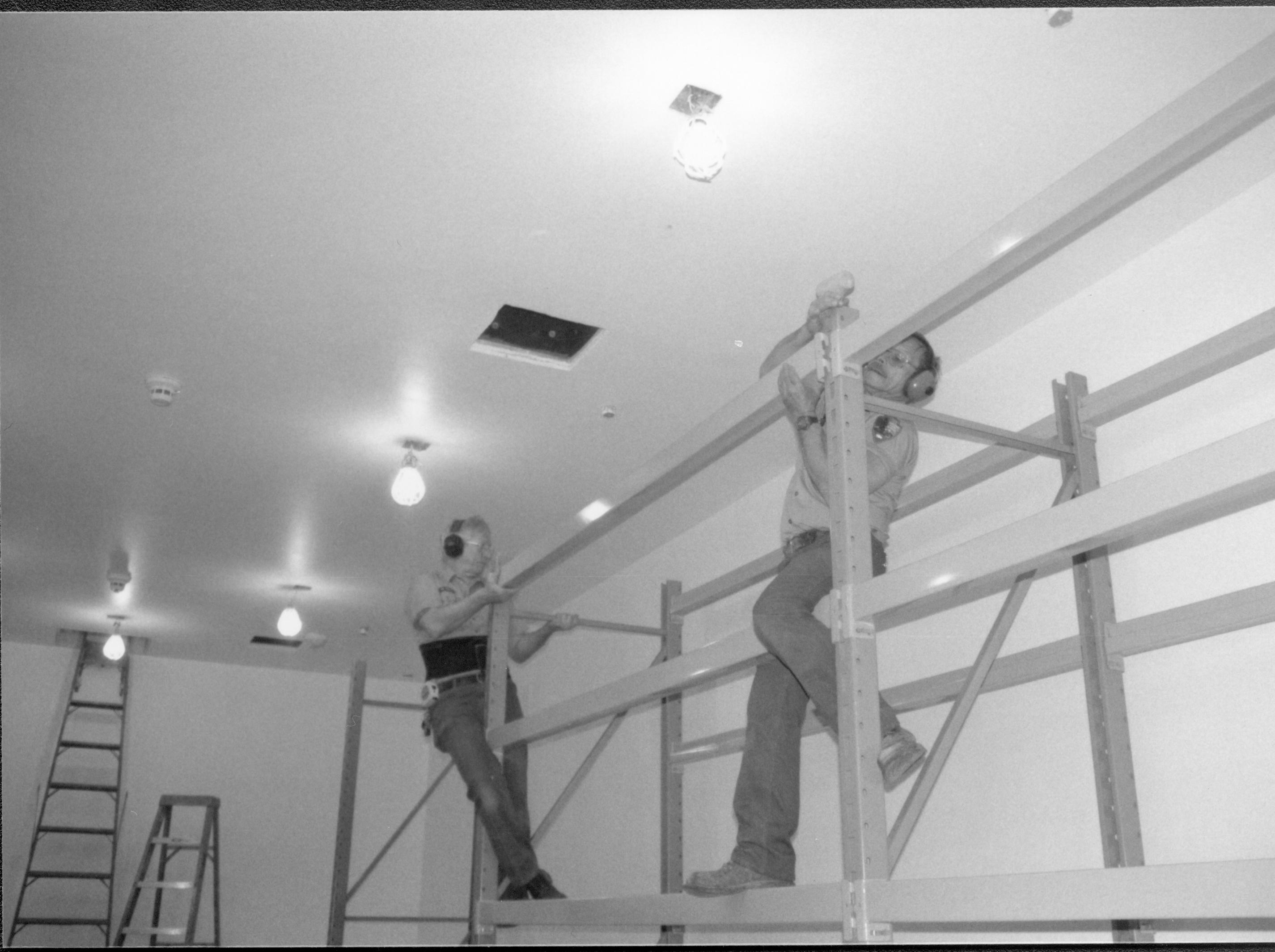 Storage shelves built and installed along the North wall in the Arnold Barn facility Lincoln Home NHS, CRS Collection Move, Arnold Barn, Roll N11, exp 12, sheet 3 of 5 Arnold Barn, move, storage