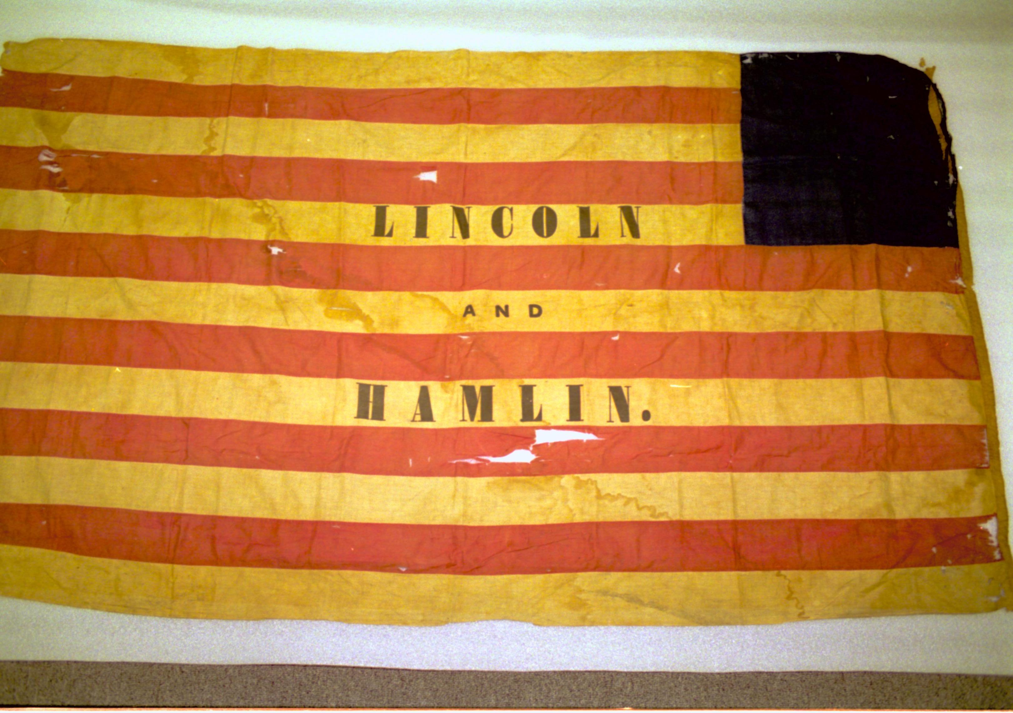 NA Museum Services-Storage-Curatorial Storage Renovation (Acc189 LIHO 7259, Acc LIHO 553 flag, campaign