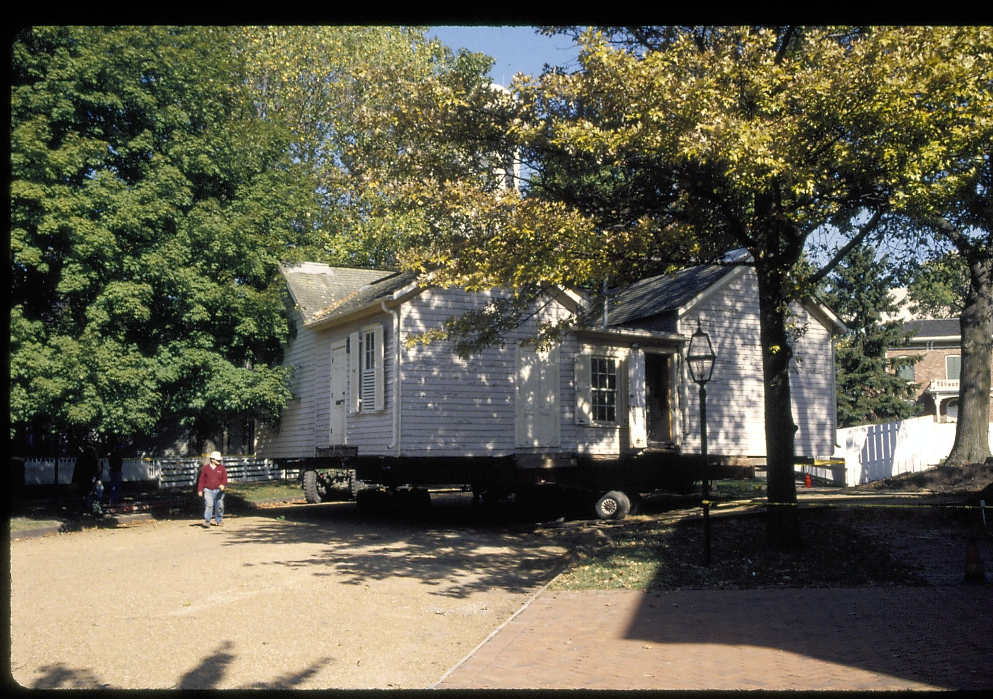 former east side of house on street Lincoln Home NHS- Corneau House move, Roll #1 color slides, exp 25 Corneau House, move