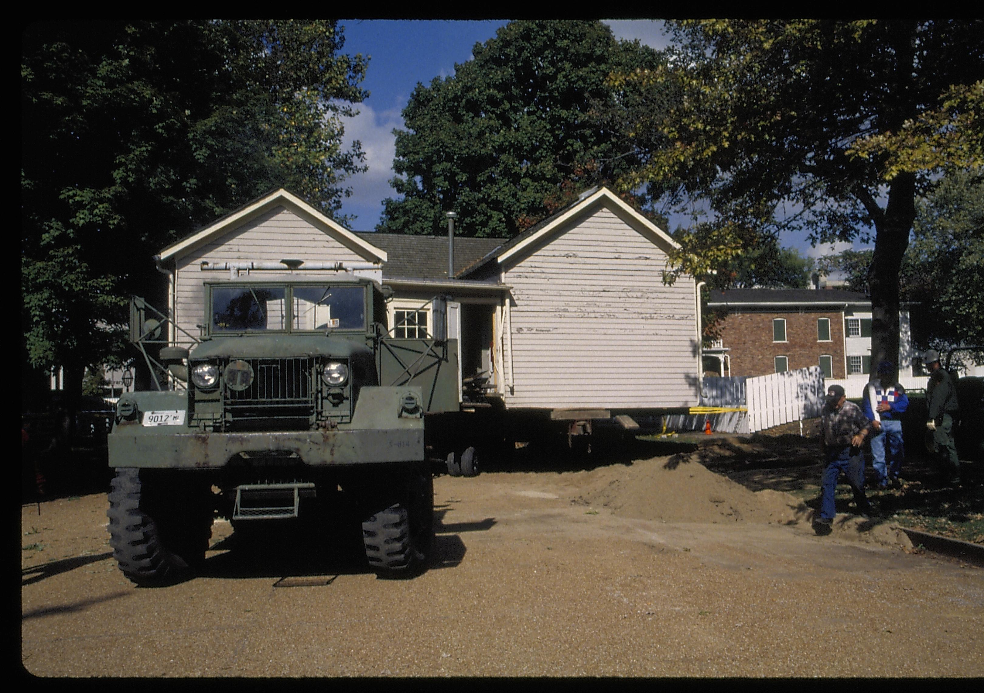 beginning to move down 8th Street Lincoln Home NHS- Corneau House move, Roll #1 color slides, exp 37 Corneau House, move