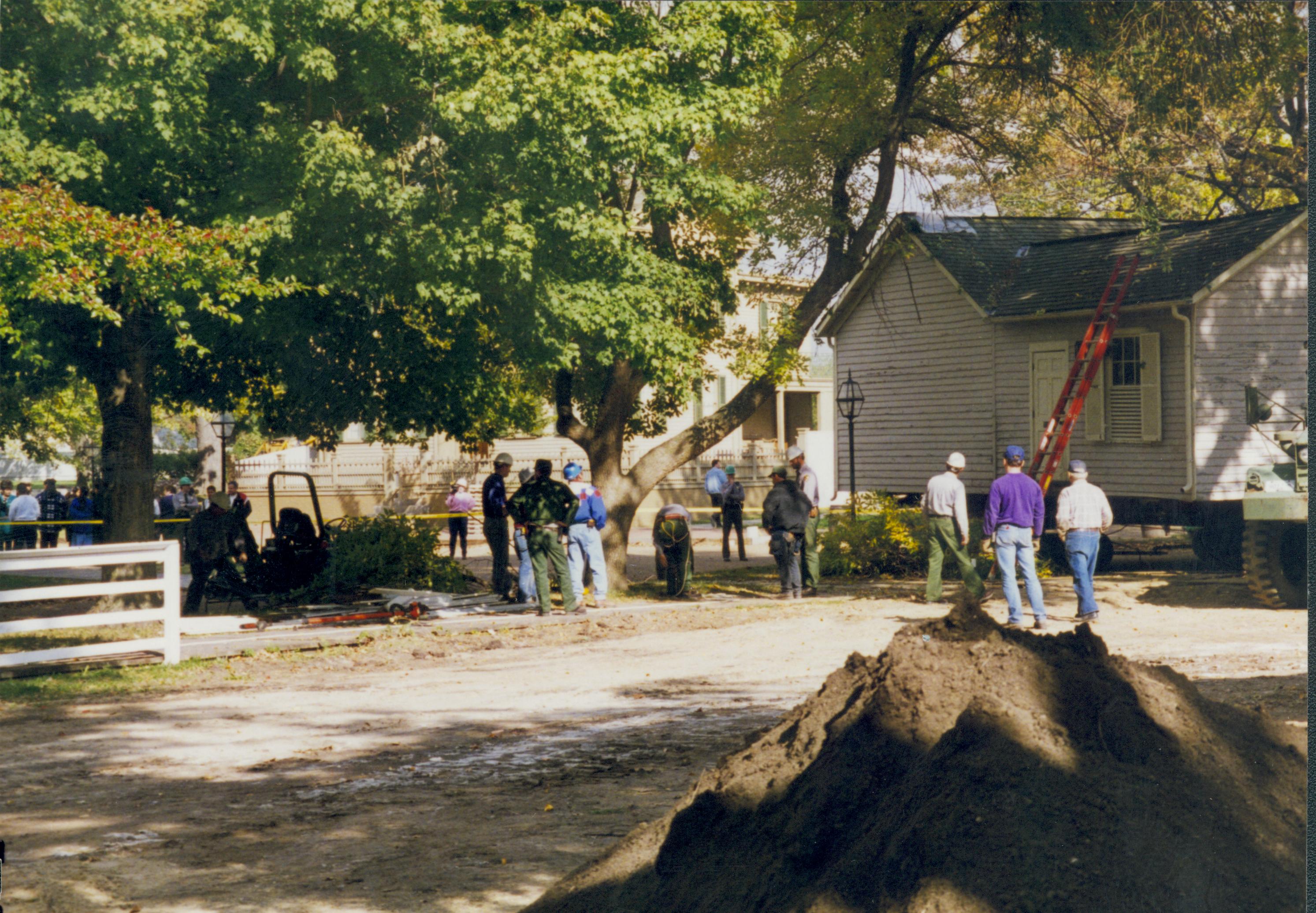 Corneau House move, maintainence staff preparing to cut down trees Lincoln Home NHS- Corneau House move, exp 18 Corneau House, move