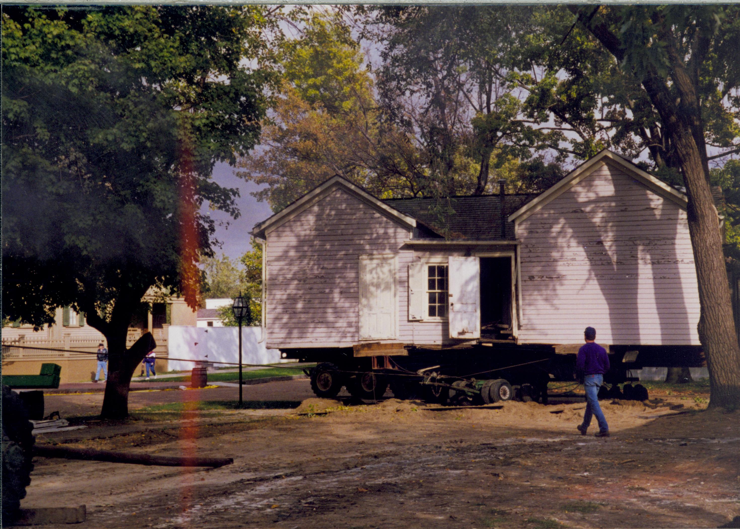 Corneau House move; being pulled onto lot 16 (block 6) Lincoln Home NHS- Corneau House move, exp 1 Corneau House, move