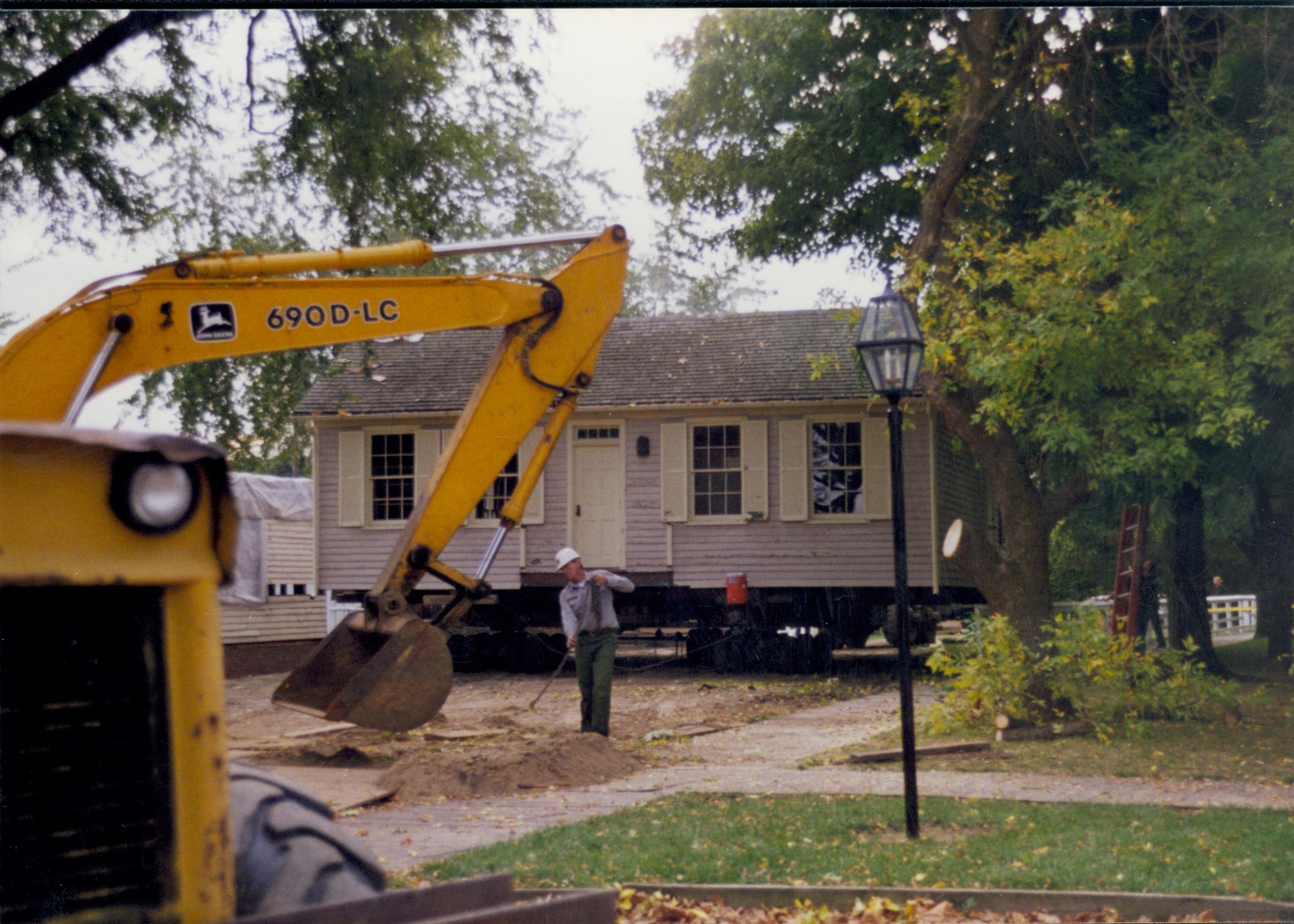 Corneau House move; moving heavy equipment around lot Lincoln Home NHS- Corneau House move, exp 8 Corneau House, move