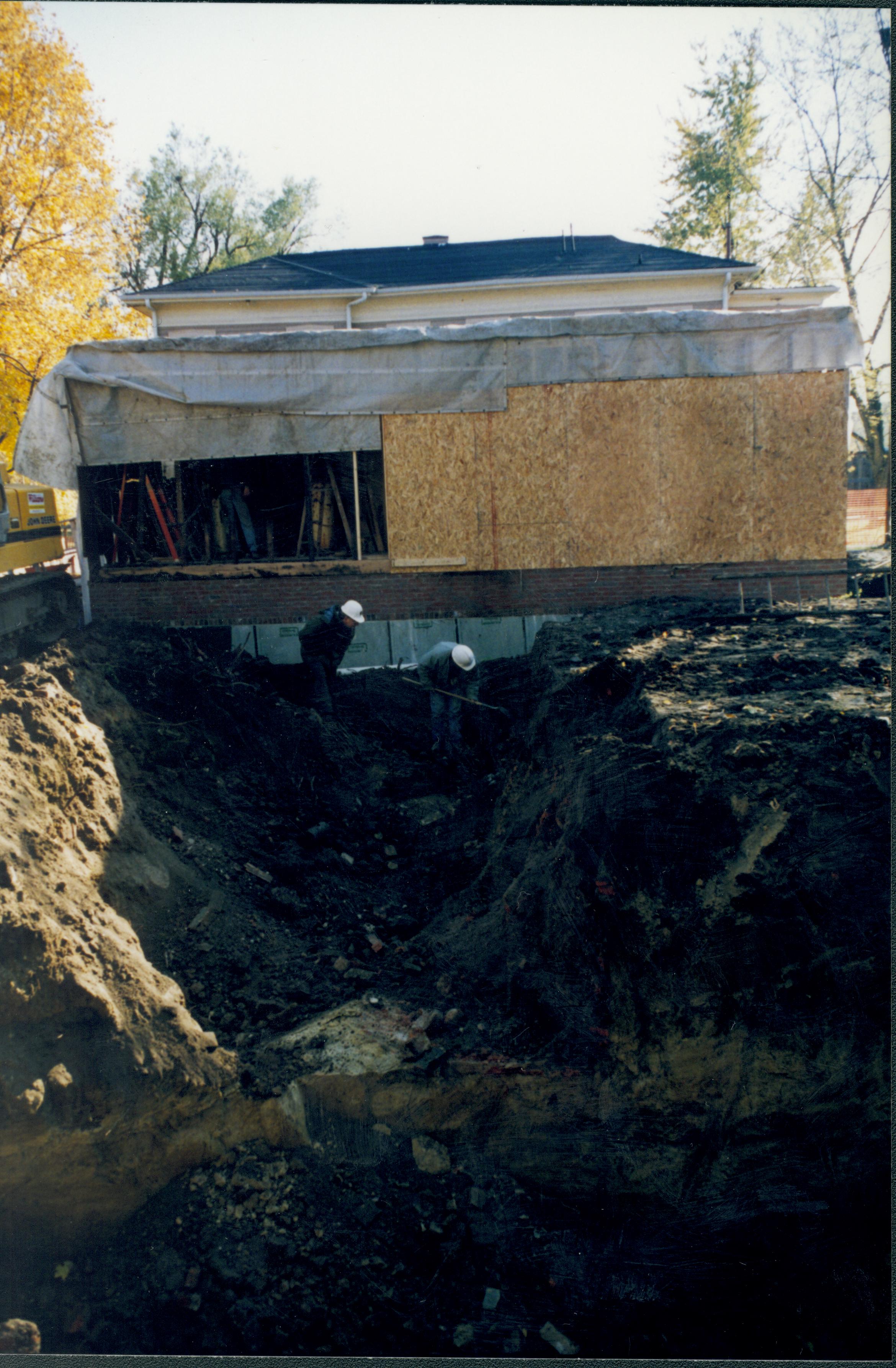 Excavating foundations for Corneau. North wall of Sprigg in background Lincoln Home NHS- Corneau House and Lot, Roll N5 exp 14 Corneau, move