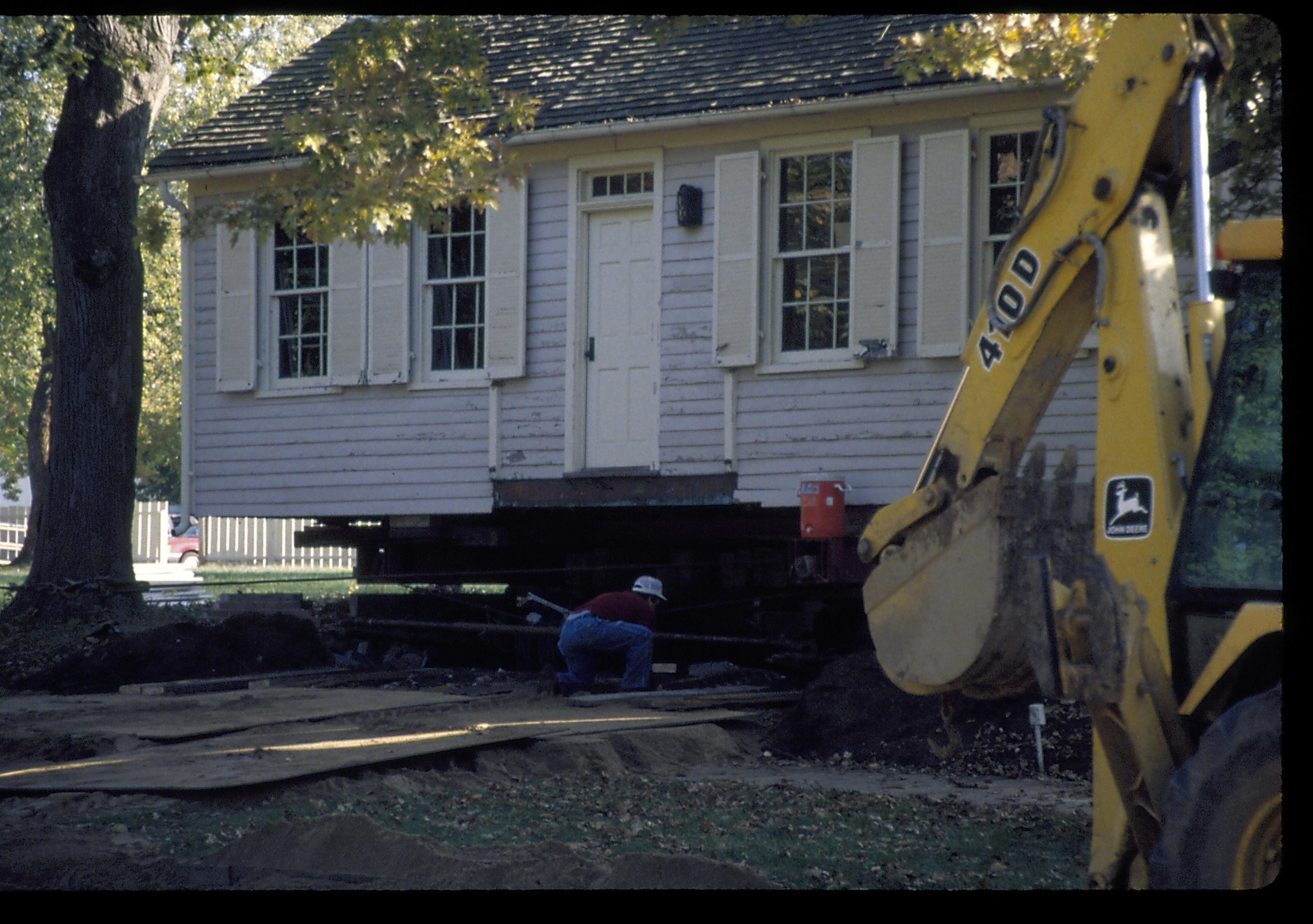 House on skids- prep to move Lincoln Home NHS- Corneau House move, Roll #1 color slides, exp 10 Corneau House, move