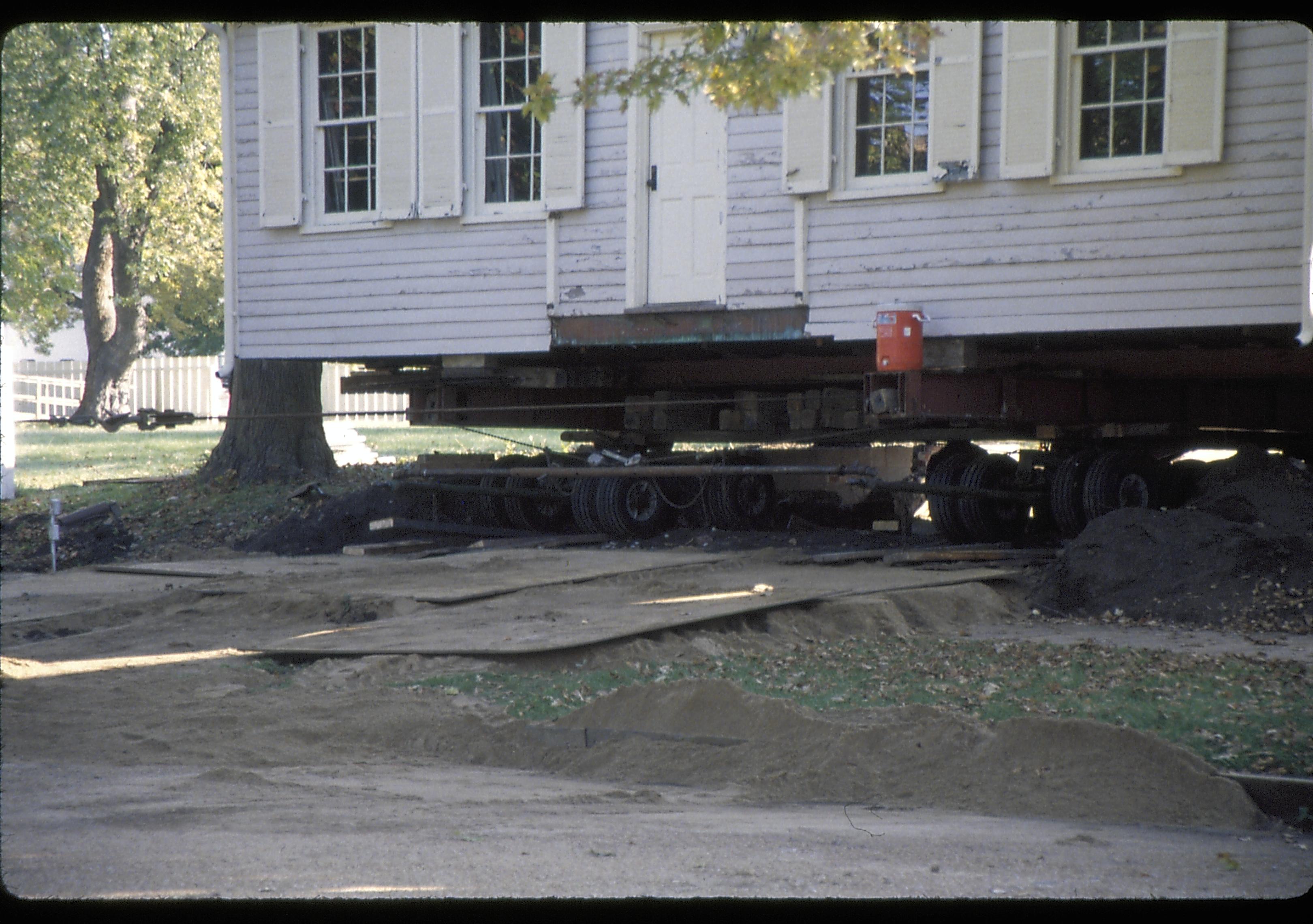 House on skids- prep to move Lincoln Home NHS- Corneau House move, Roll #1 color slides, exp 11 Corneau House, move