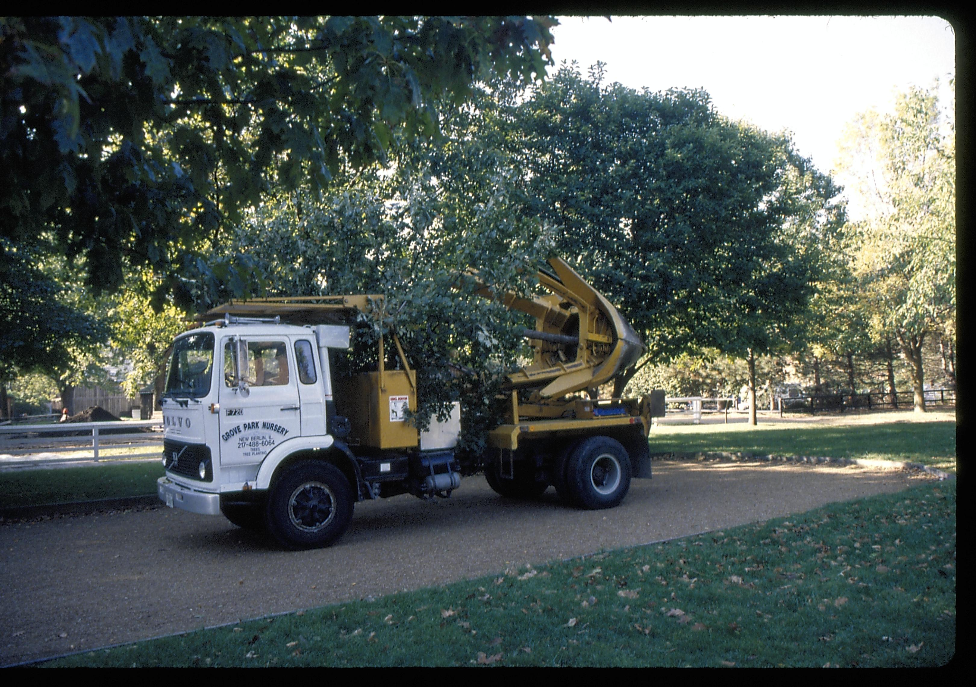 Oak tree temp removal on truck Lincoln Home NHS- Corneau House move, Roll #1 color slides, exp 13 Corneau House, move