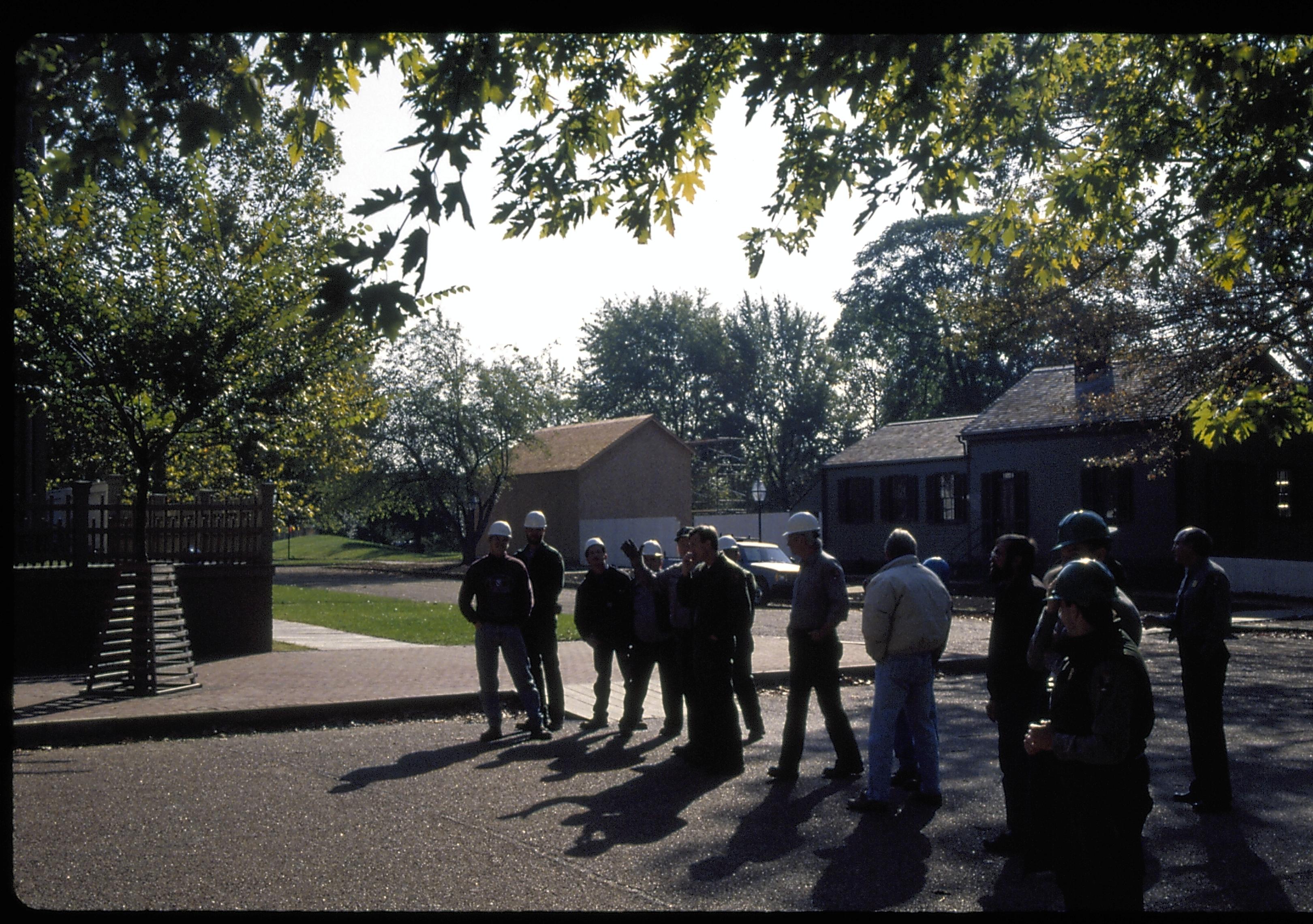 staff watching move Lincoln Home NHS- Corneau House move, Roll #1 color slides, exp 19 Corneau House, move