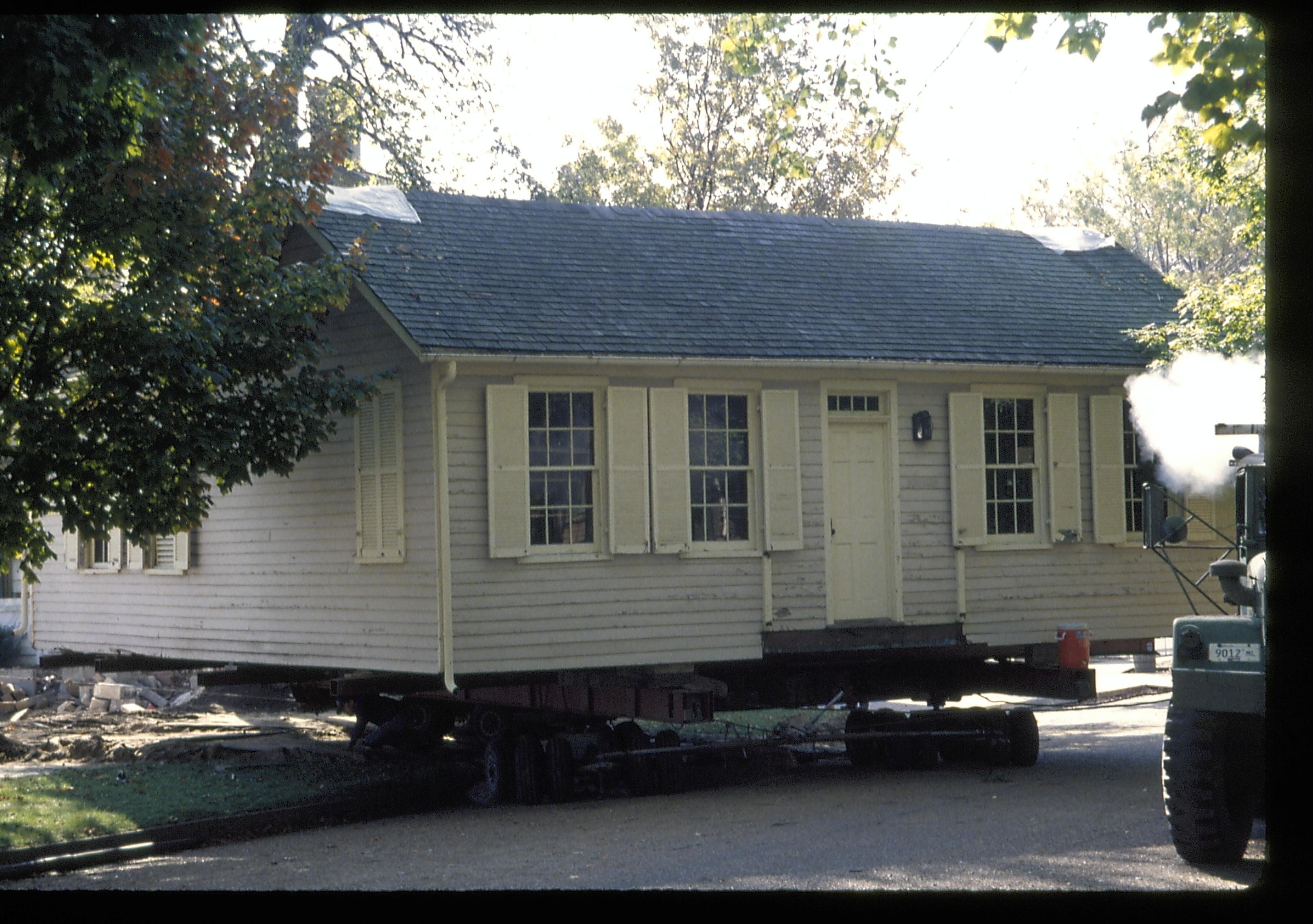 House moving onto street Lincoln Home NHS- Corneau House move, Roll #1 color slides, exp 21 Corneau House, move