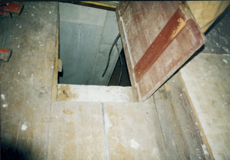Trap-door opened, looking into basement. Photo taken looking North Lincoln Home NHS- Corneau House Restoration, roll N4 exp 19 Corneau House, restoration, trap door