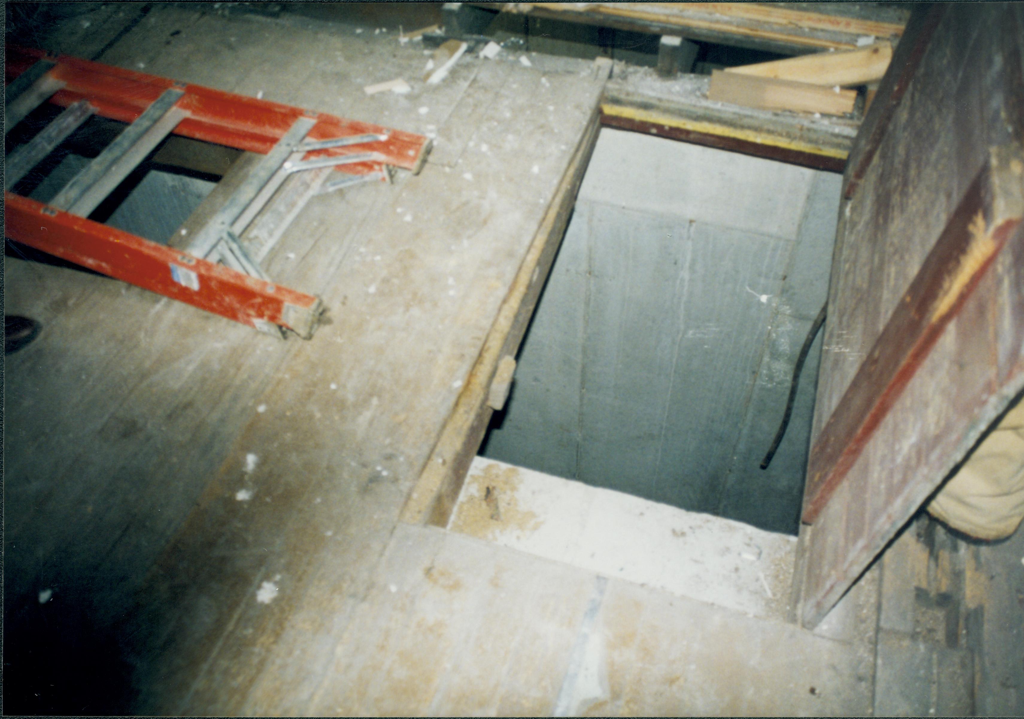 Trap-door opened, looking into basement. Photo taken looking North/Northwest Lincoln Home NHS- Corneau House Restoration, roll N4 exp 20 Corneau House, restoration, trap door