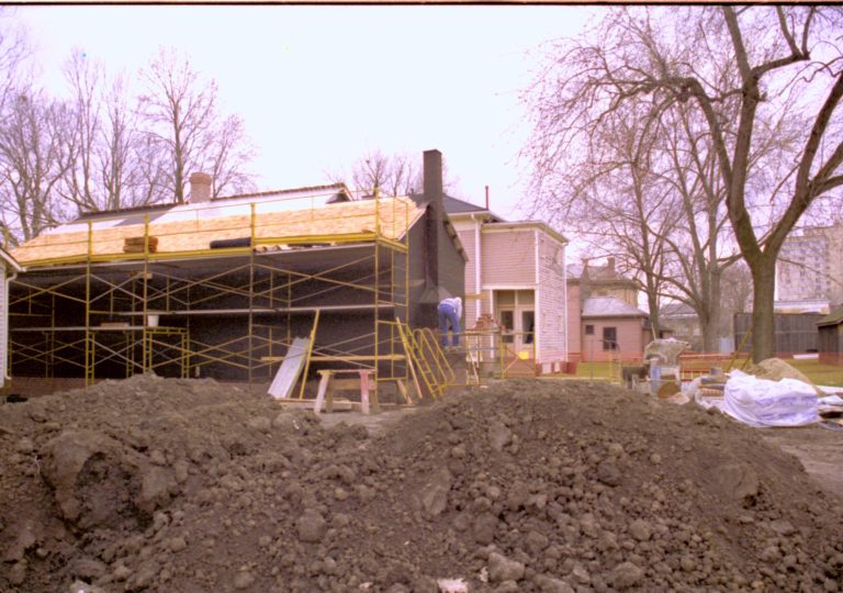 Northwest corner and North and West walls. West end of mIller in background Lincoln Home NHS- Corneau House Restoration, roll N4 exp 24 Sprigg House, restoration