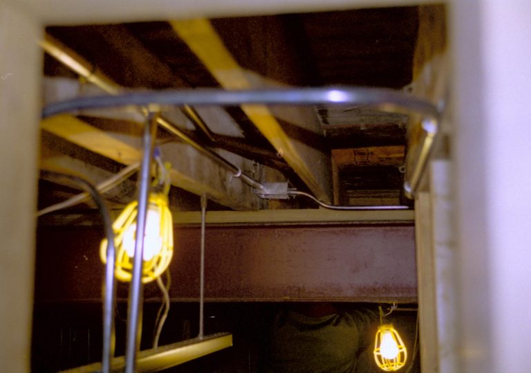 Looking at roof of basement while heating/electrical system being installed Lincoln Home NHS- Corneau House Restoration, roll N4 exp 34 Sprigg House, restoration