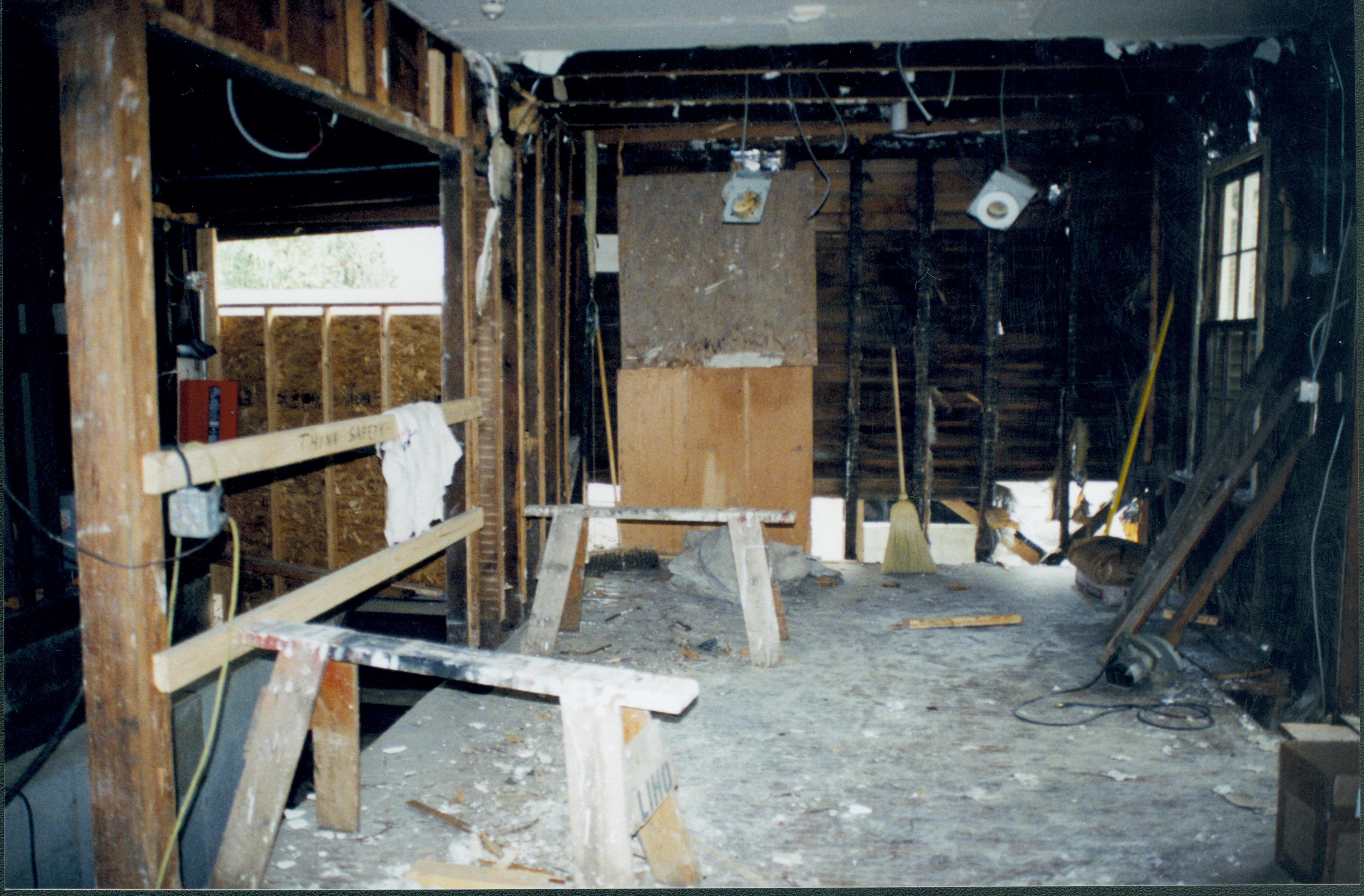 Looking towards West wall. North entrance door (not visible) at right of photo; basement entrance at left (can see stairs running down) Lincoln Home NHS- Corneau House Restoration, roll N6 exp 7 Corneau House, restoration