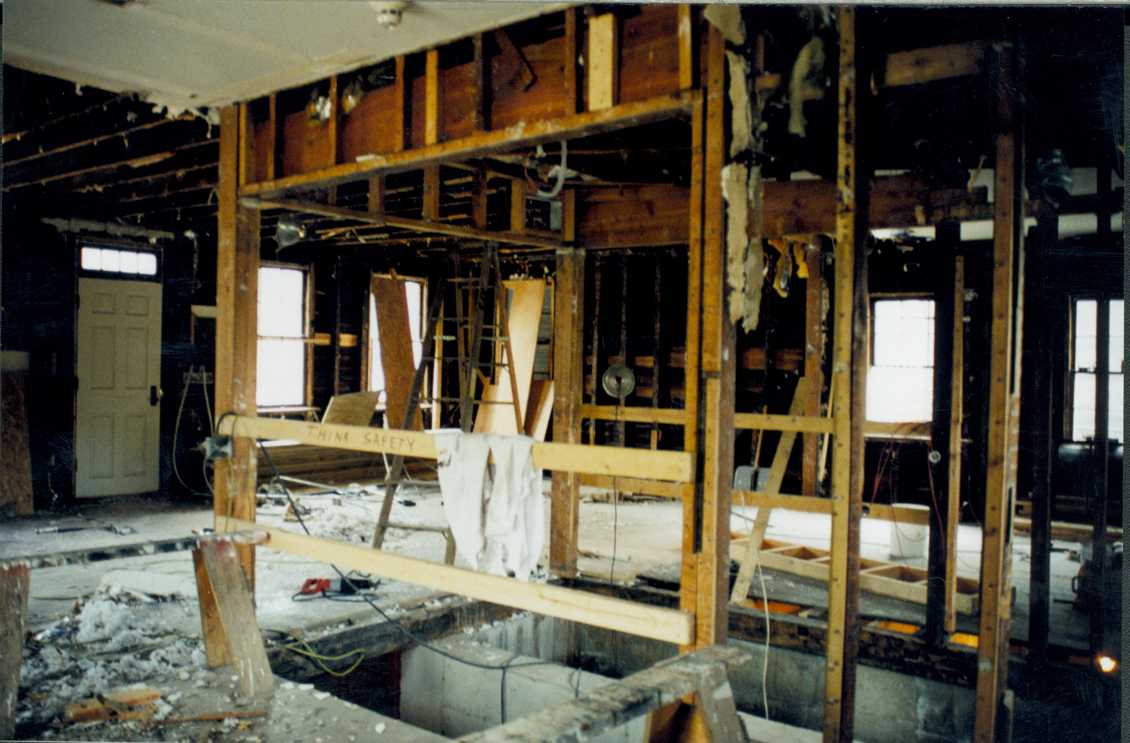 Standing at Northwest interior corner, looking towards Southeast corner (in middle of photo). East and South walls and basement entrance visible Lincoln Home NHS- Corneau House Restoration, roll N6 exp 8 Corneau House, restoration