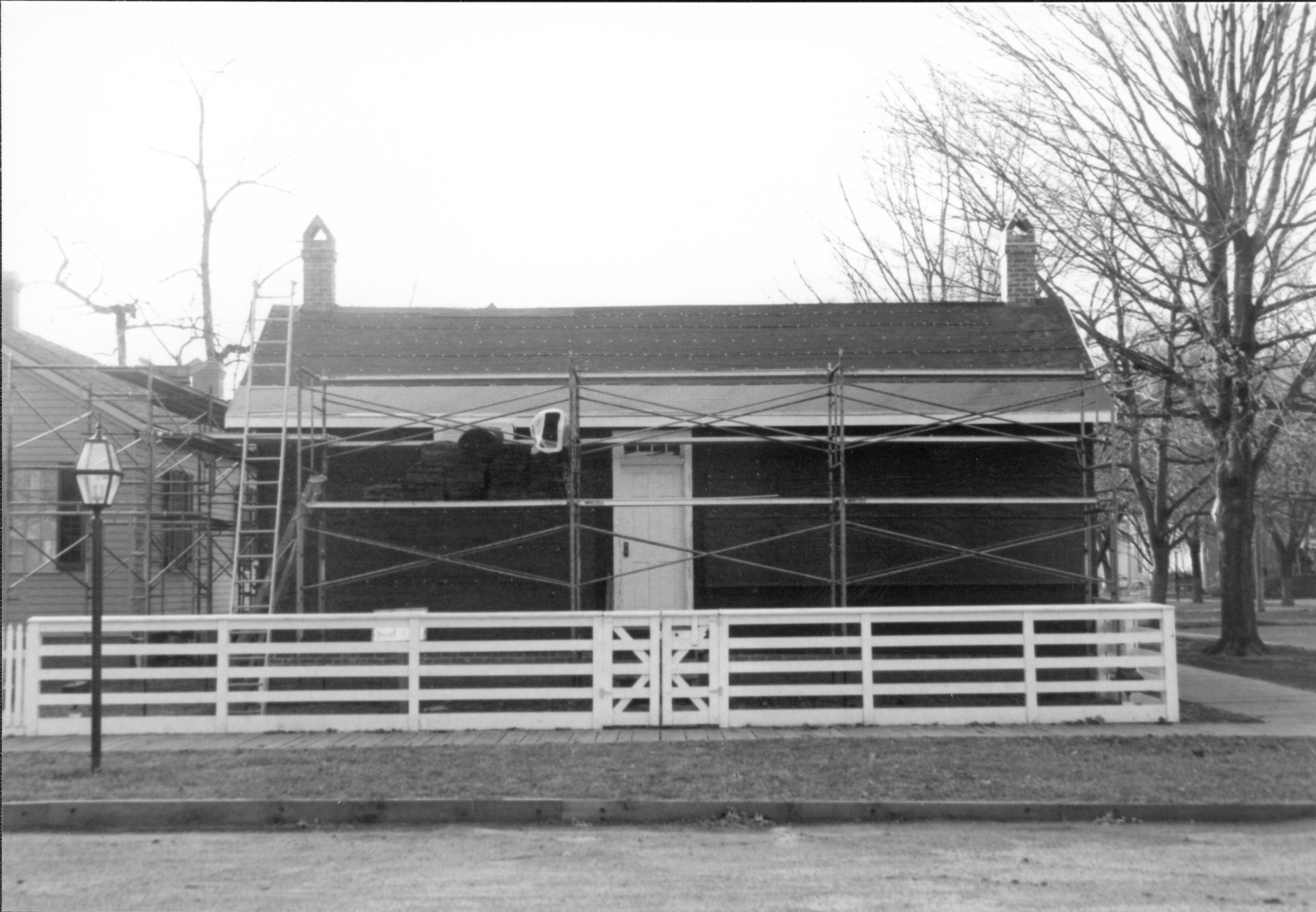 Corneau - restoration, scaffolding installed on East elevation. Sprigg House on left. Looking West from 8th Street Corneau, restoration, scaffolding, Sprigg, 8th Street