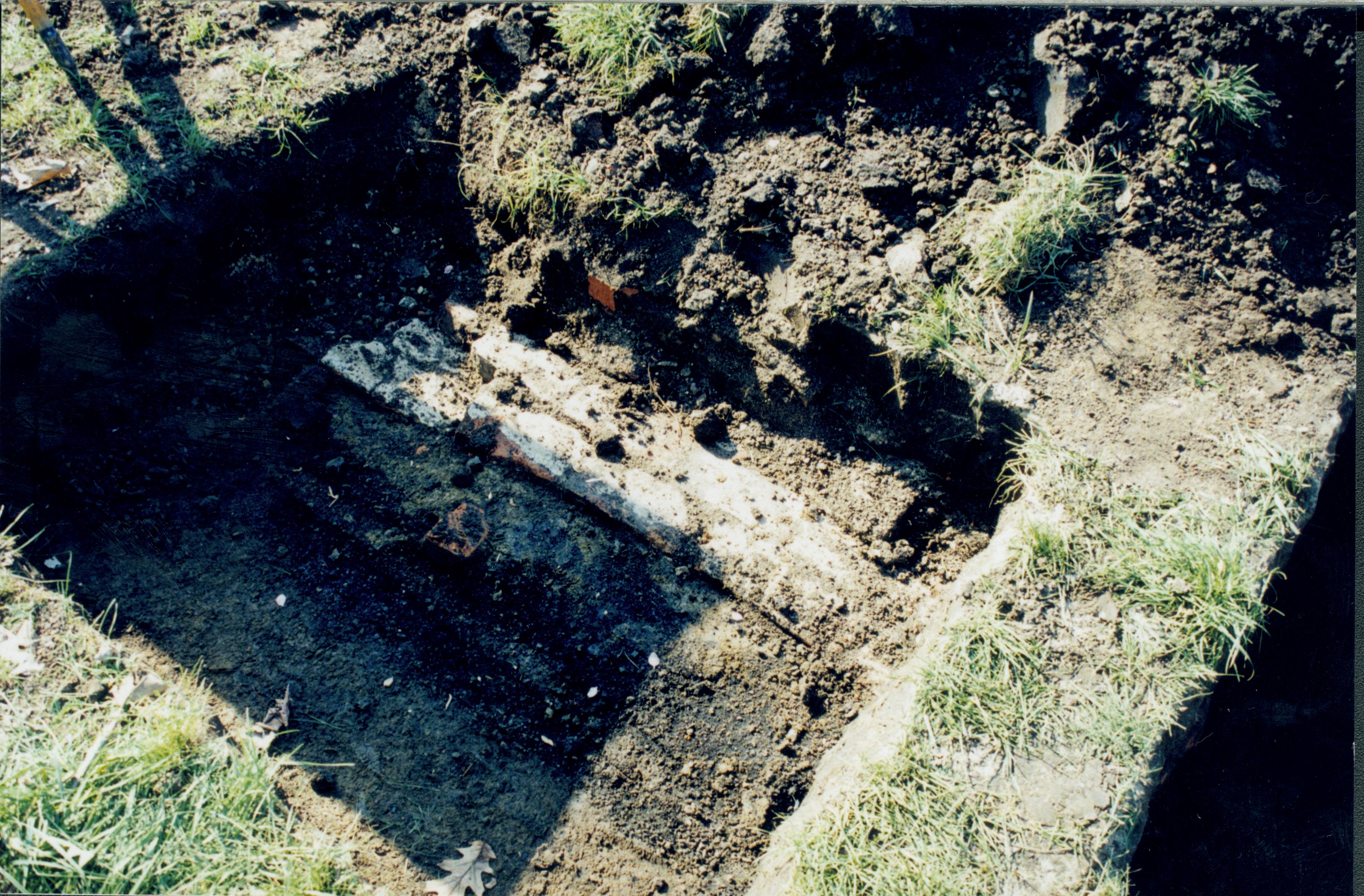 Uncovered foundation while searching for 1880s barn. Apperas to be associated with later structure. Lincoln Home NHS- Corneau House Restoration, roll N6 exp 22 Corneau House, restoration