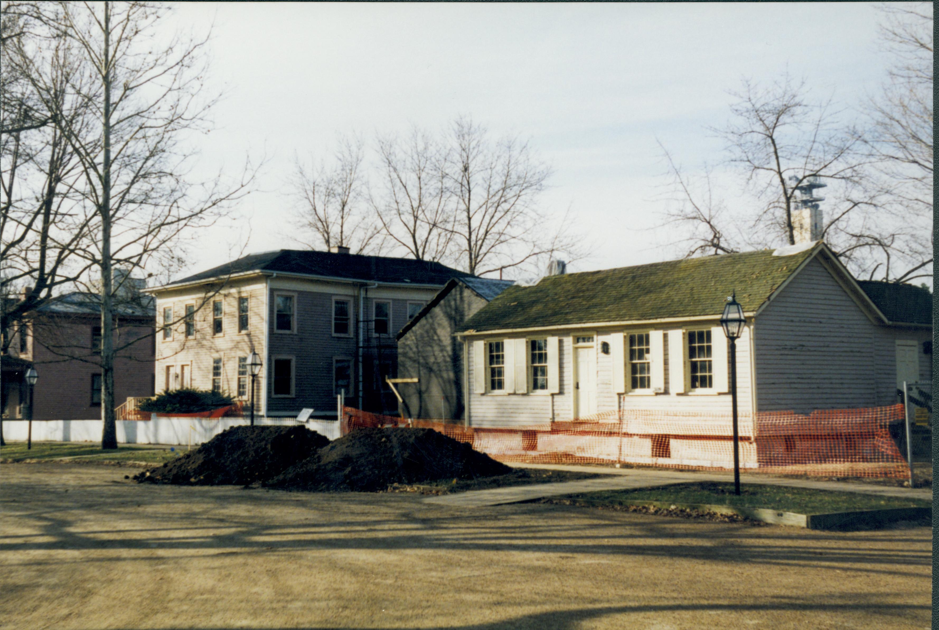 (external) elevations; photo taken from in front of Lincoln Home, across intersection; construction in process Lincoln Home NHS- Corneau House Restoration, roll N1 exp 21 Corneau House, restoration