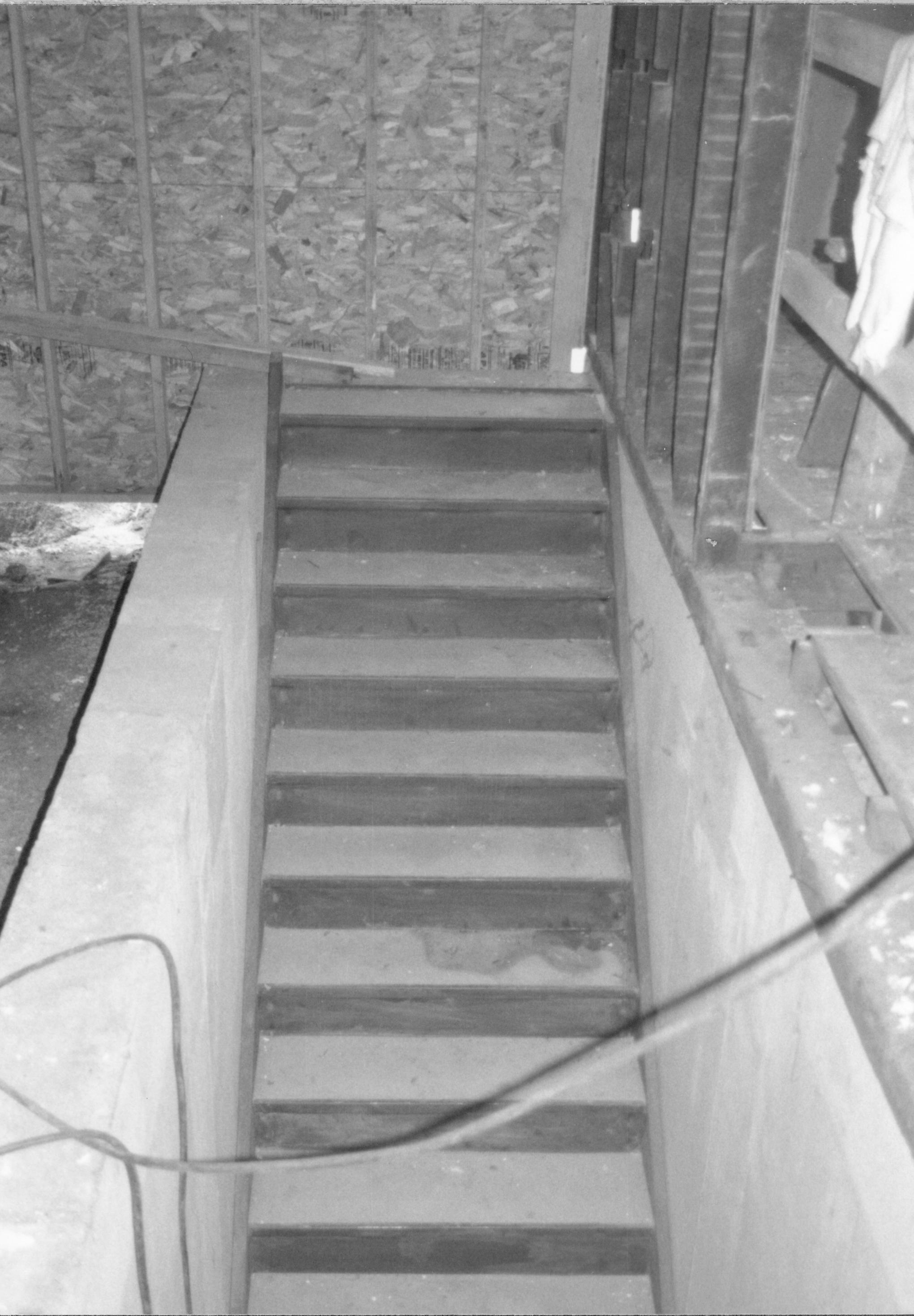 Stairway leading from gound floor to basement. Photo from 1st floor, looking West Lincoln Home NHS- Corneau House Restoration, roll N11 exp 18 Corneau House, renovation