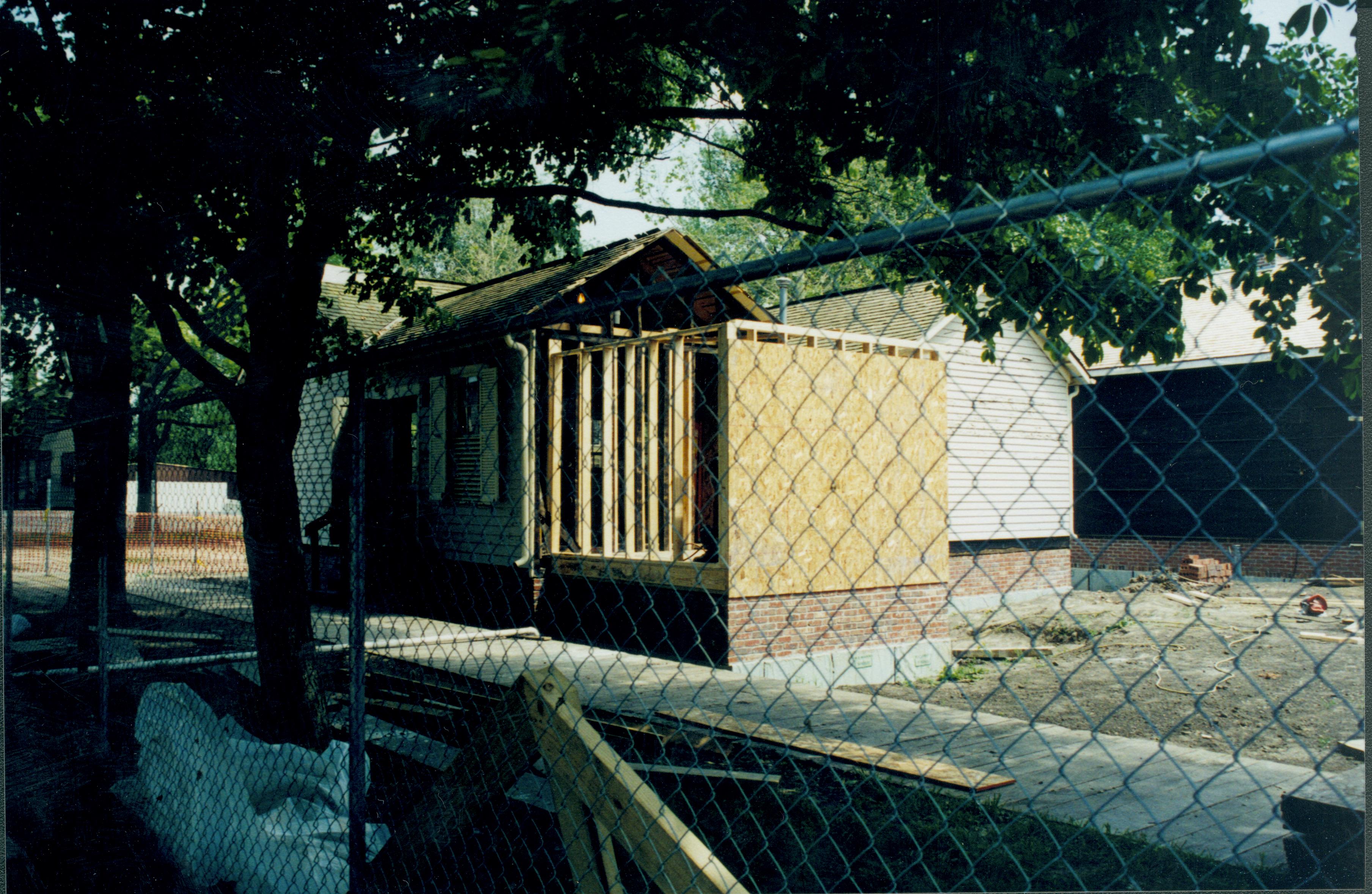 Construction of room 105; West and North walls of structure. Studs in place and plywood being attached Lincoln Home NHS- Corneau House Restoration, roll N8 exp 6 Corneau House, renovation