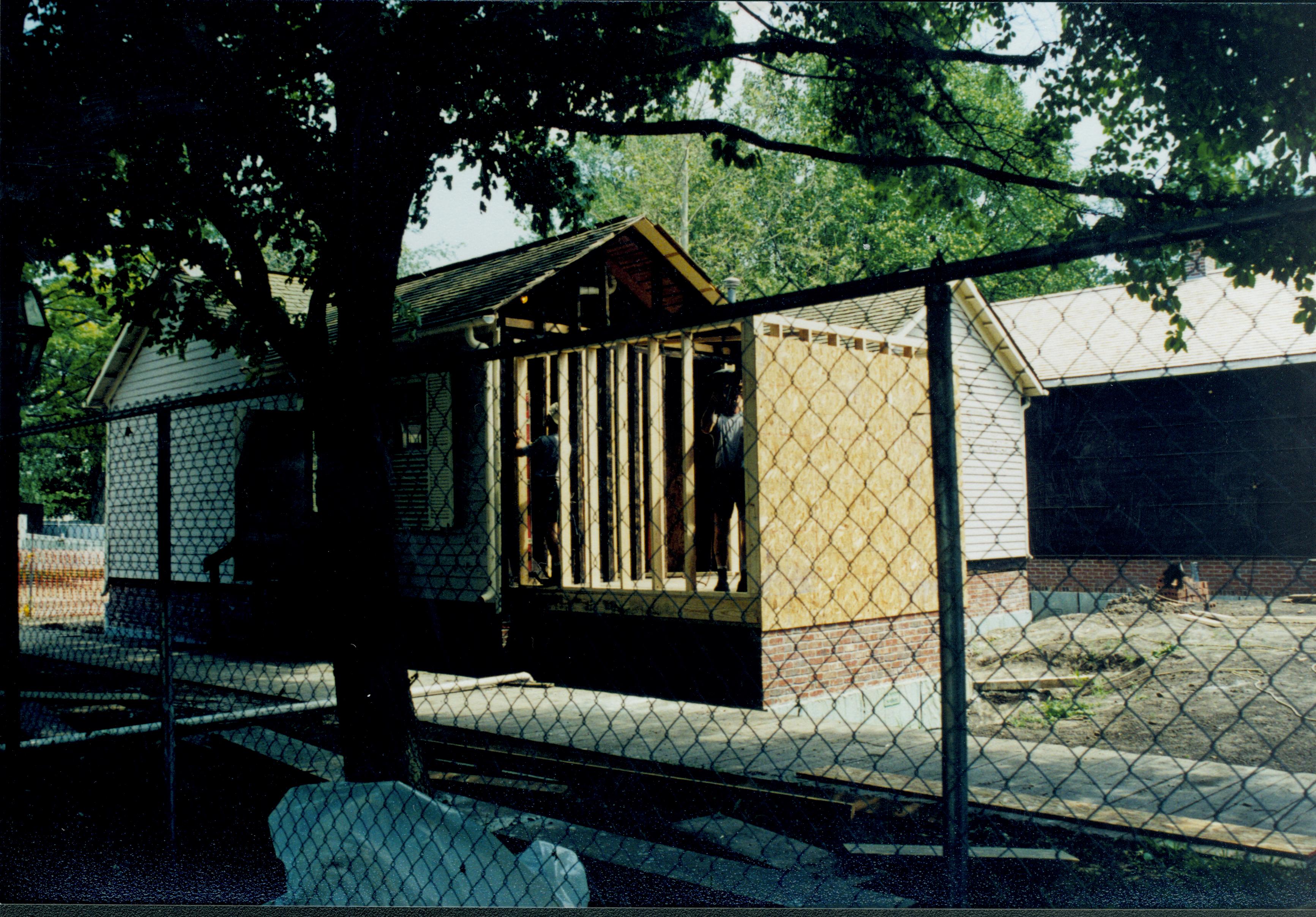 Construction of room 105; West and North walls of structure. Studs in place and plywood being attached Lincoln Home NHS- Corneau House Restoration, roll N8 exp 7 Corneau House, renovation