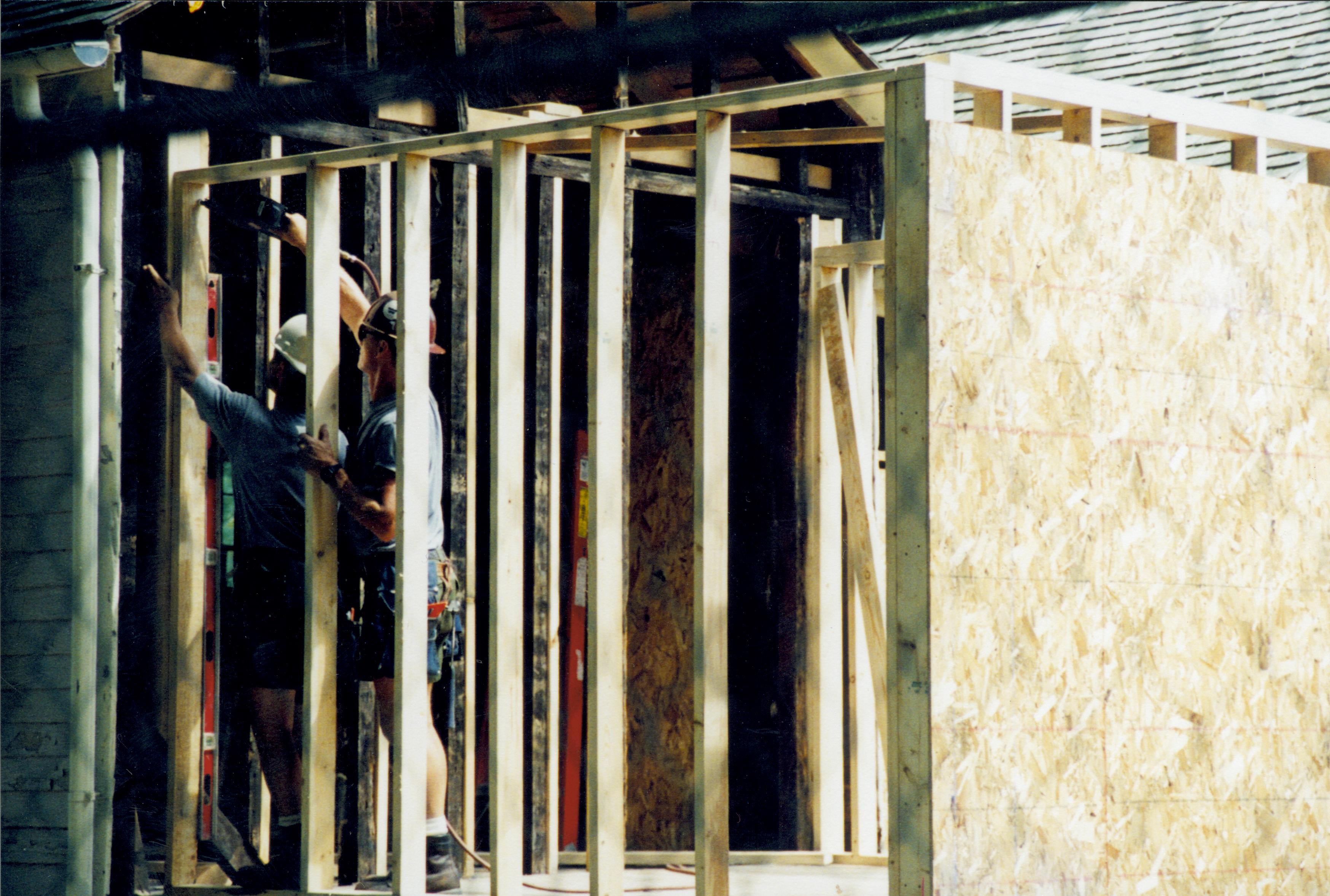 North wall and Northwest corner of room 105; West wall covered with plywood; North wall studs being erected Lincoln Home NHS- Corneau House Restoration, roll N8 exp 8 Corneau House, renovation