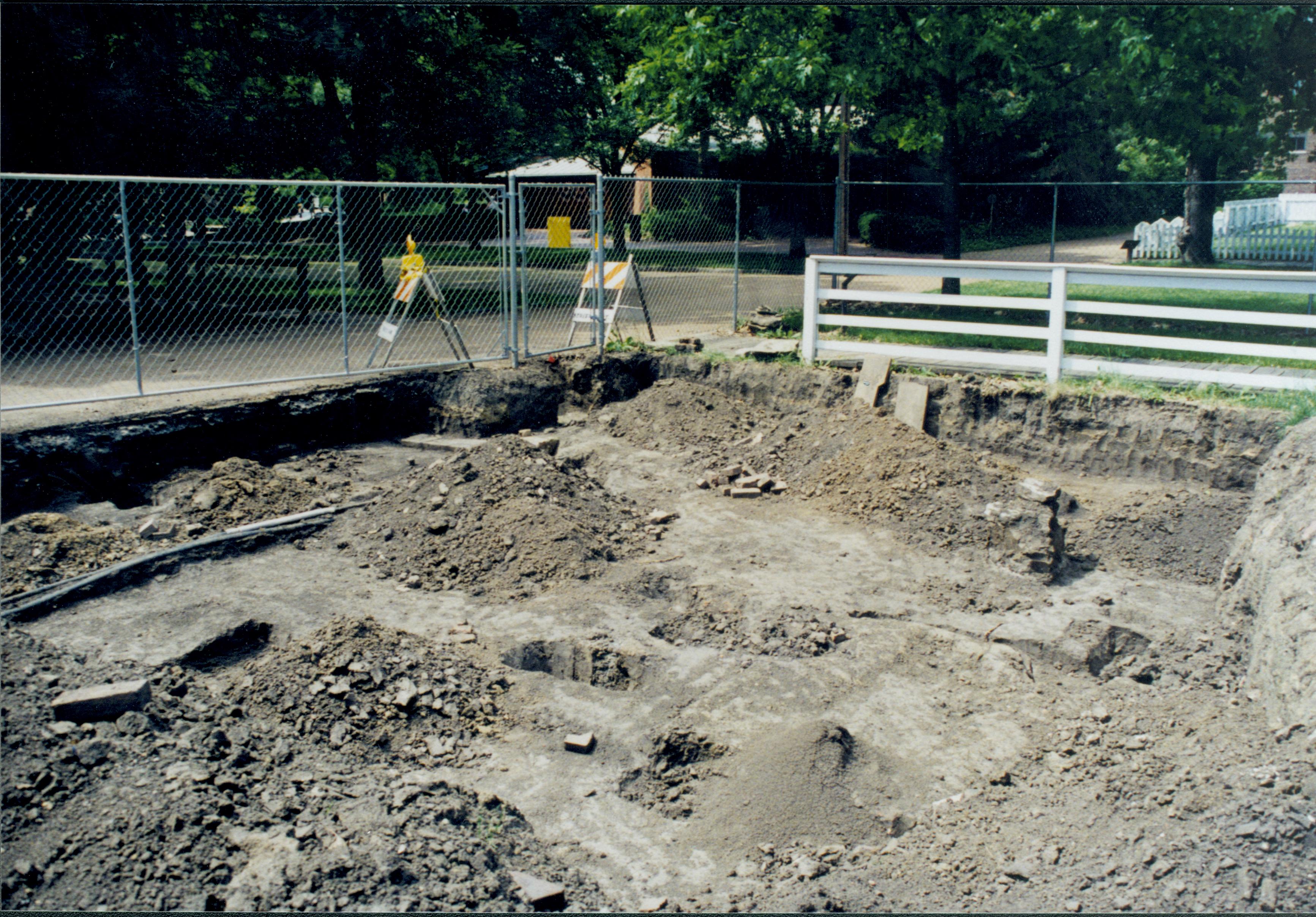 Excavations on West end of Corneau lot. Northwest corner of lot with features Lincoln Home NHS- Corneau House Restoration, roll N8 exp 9 Corneau House, excavation