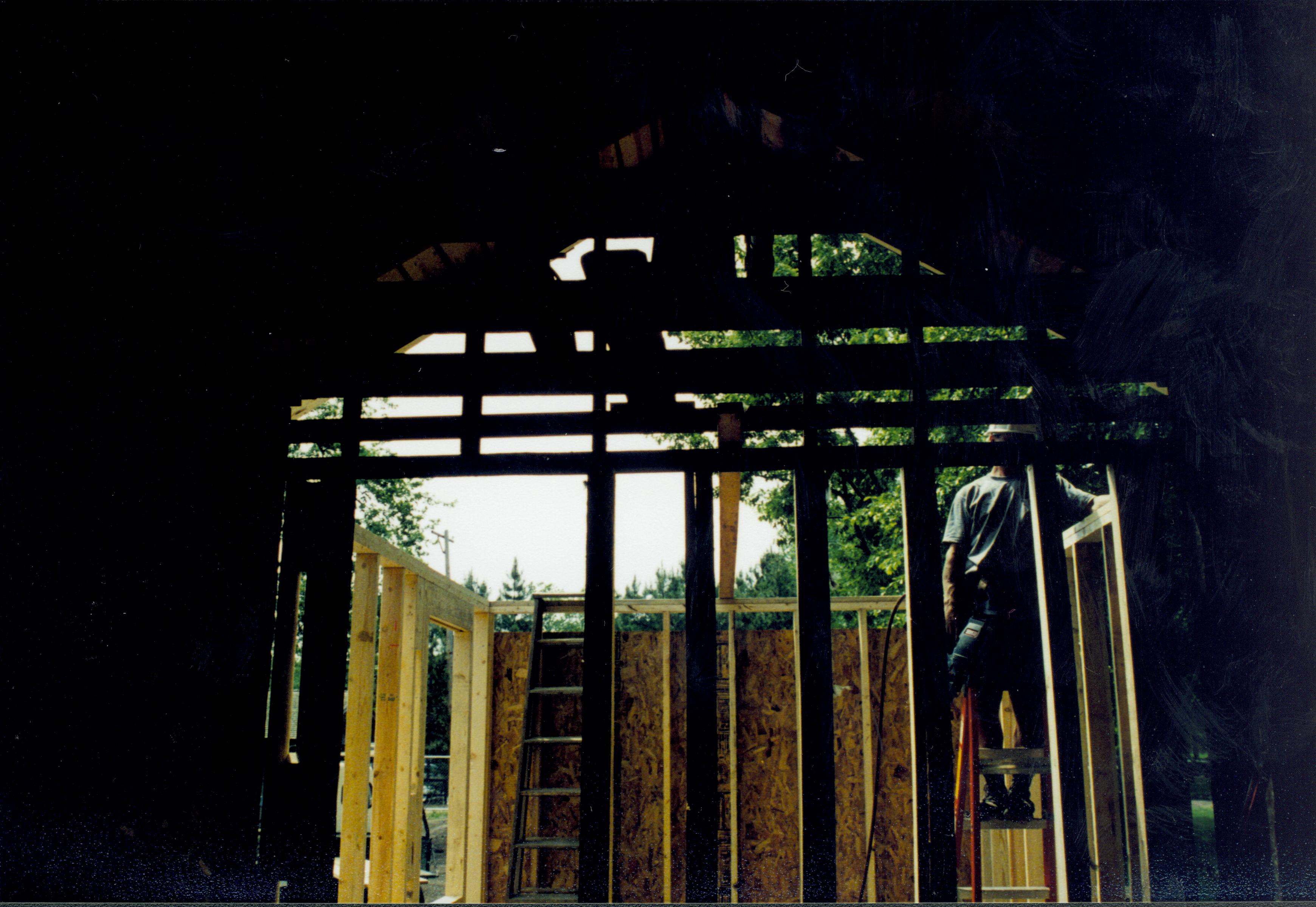 Looking West from room 104, ito room 105 (East wall in foreground). Wall studs and joists in place. Photo taken facing West Lincoln Home NHS- Corneau House Restoration, roll N8 exp 16 Corneau House, renovation