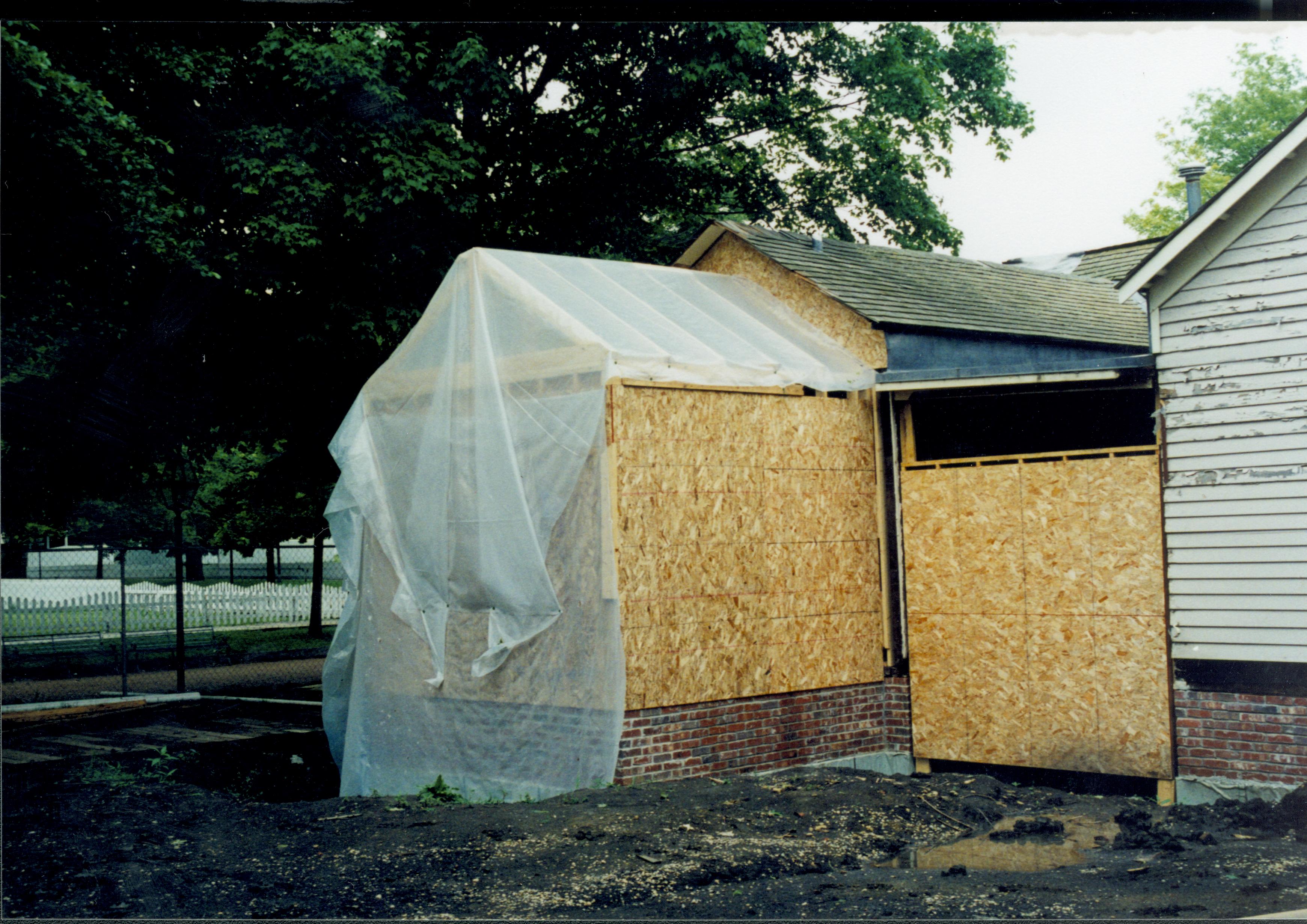 West wall of house, room 105 under construction. Foundations clearly seen Lincoln Home NHS- Corneau House Restoration, roll N8 exp 22 Corneau House, renovation