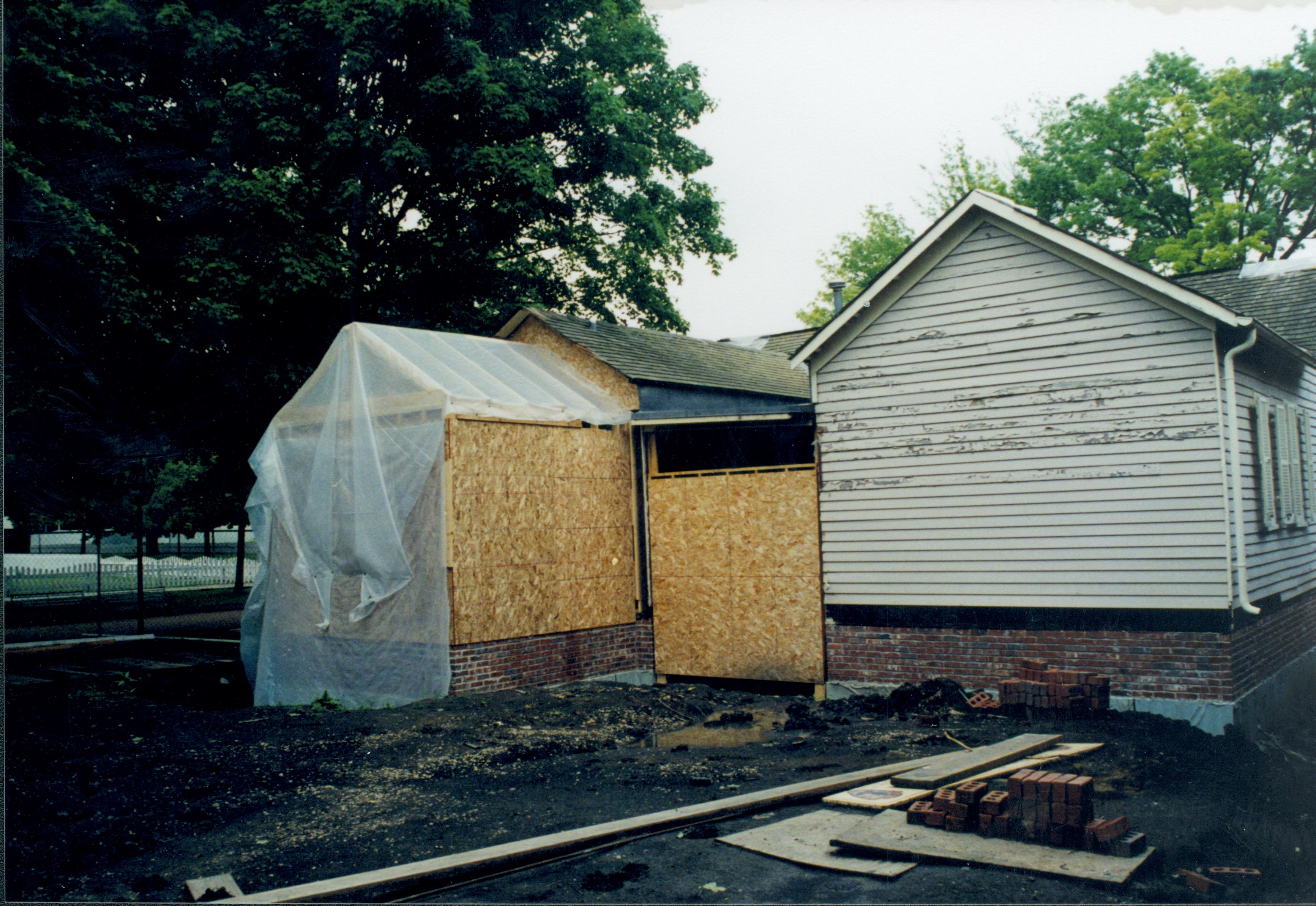 West wall of house, room 105 under construction. Foundations clearly seen Lincoln Home NHS- Corneau House Restoration, roll N8 exp 23 Corneau House, renovation