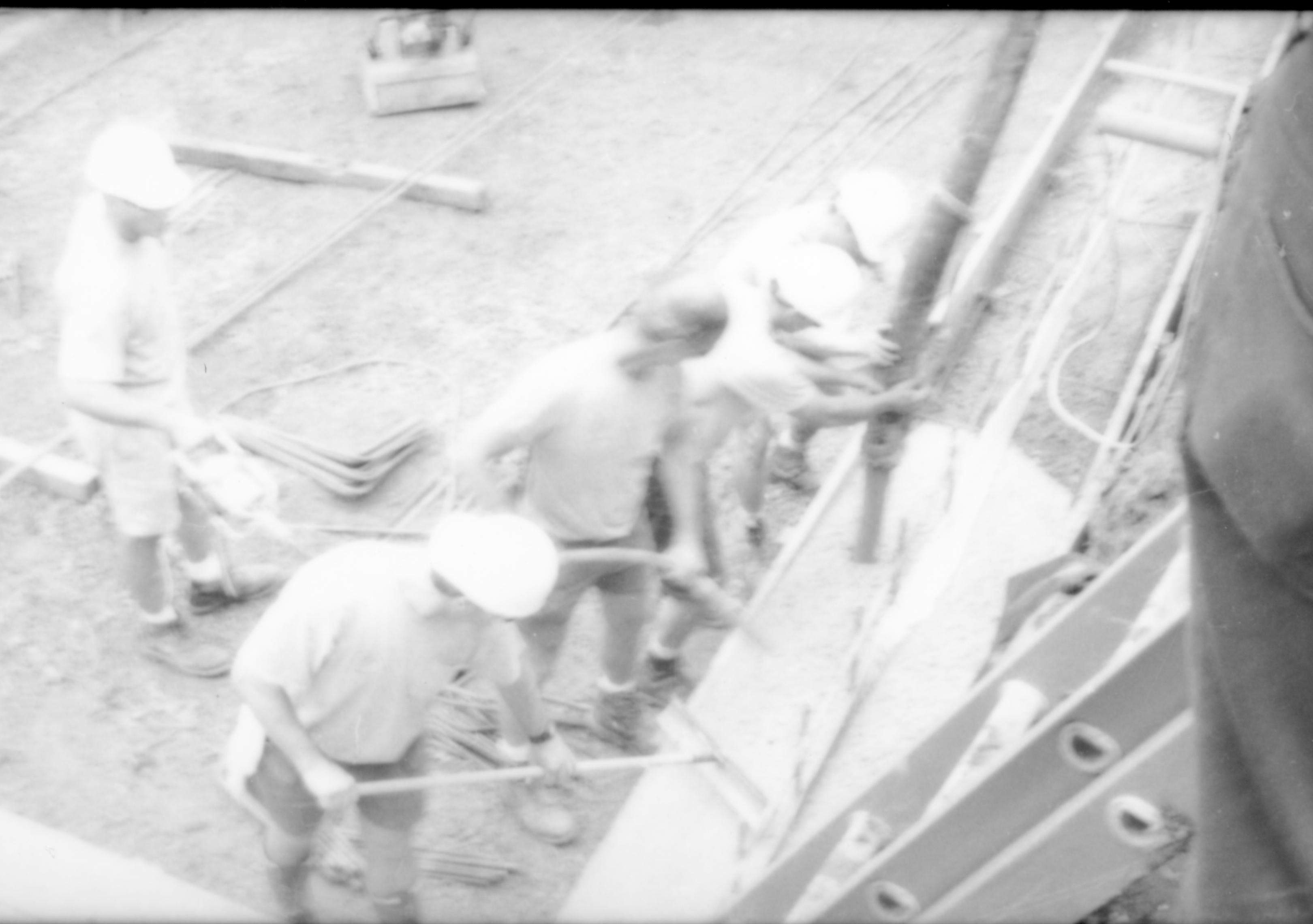 Pouring footings  Lincoln Home NHS- Corneau House Restoration, roll 1998-3 exp 5 Corneau House, renovation