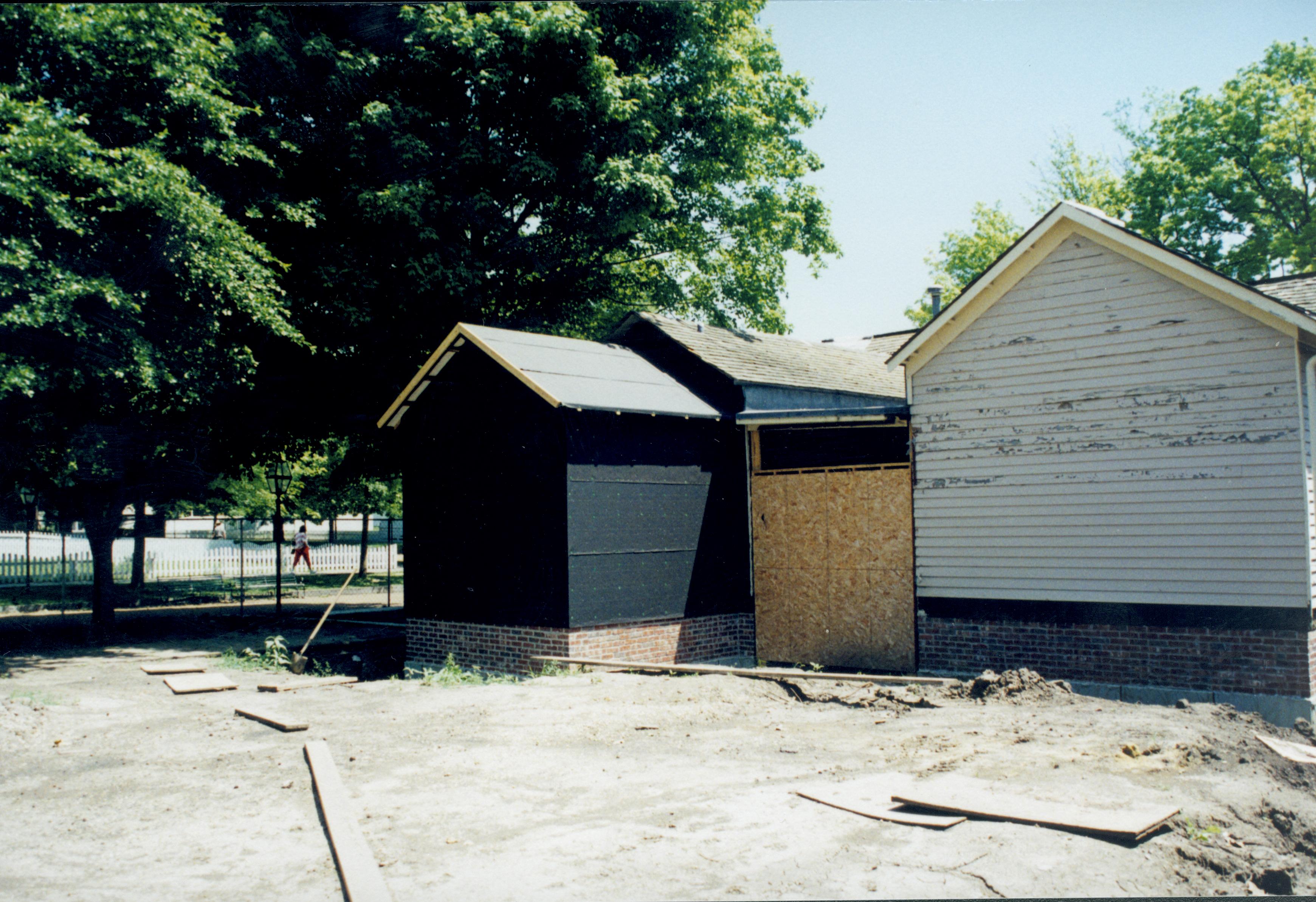 West side of structure; new addition completed and tar papered (room 105). Photo taken facing West/Northwest Lincoln Home NHS- Corneau House Restoration, roll N9 exp 5 Corneau House, restoration