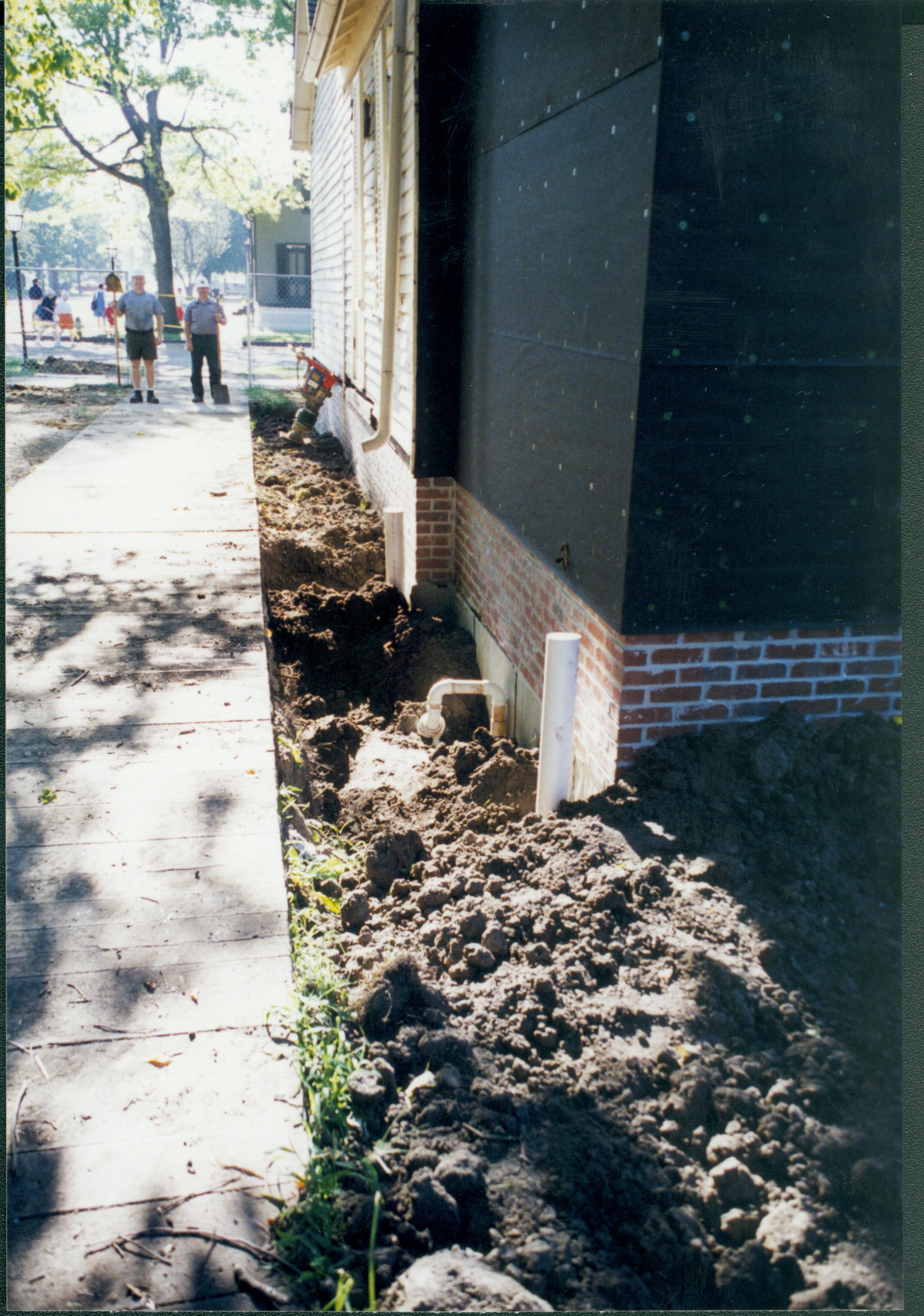 North wall/Northwest corner of sturcture after installation of some plumbing necessities Lincoln Home NHS- Corneau House Restoration, roll N13 exp 34 Corneau House, restoration