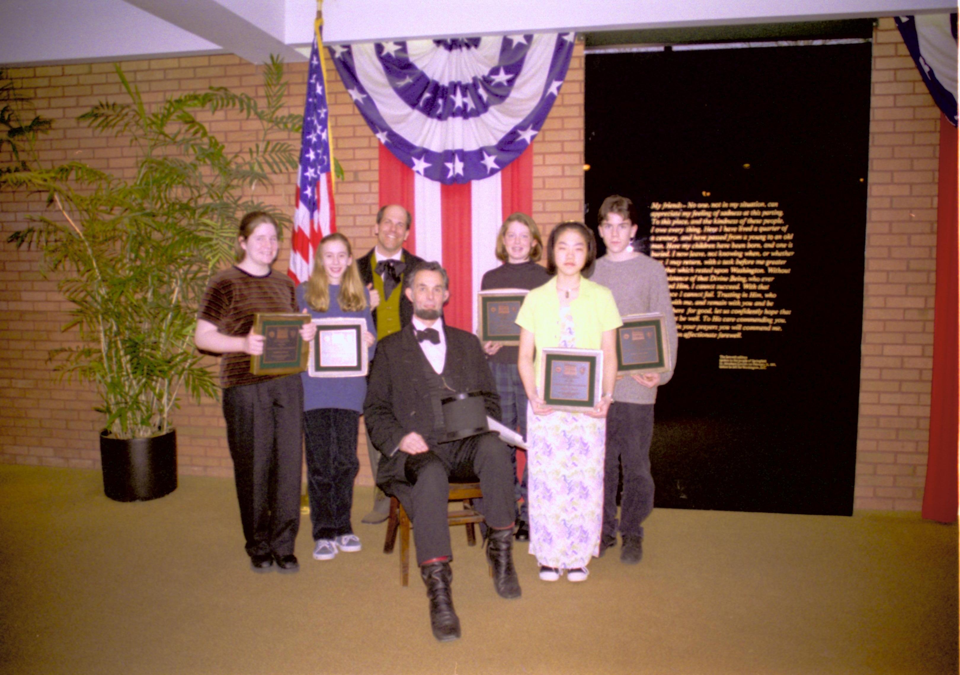 Lincoln impersonator with 1997-98 essay competition winners Lincoln Home NHS- Corneau House Restoration, roll N4 exp 2 Corneau House, restoration