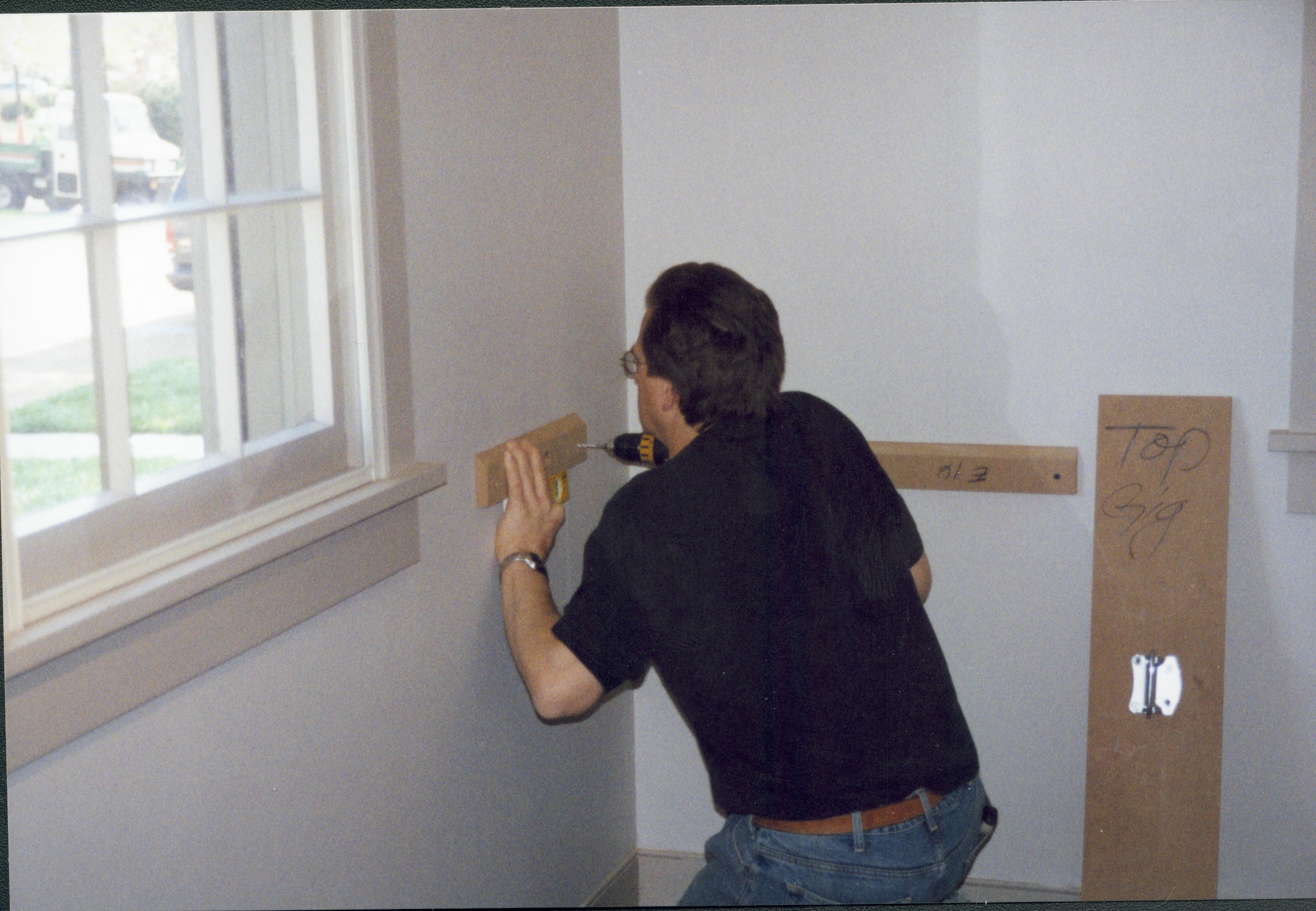 Room 101, installing cleat LIHO NHS- Arnold House Exhibit, Roll 2001-3, exp 15 Arnold House, exhibit
