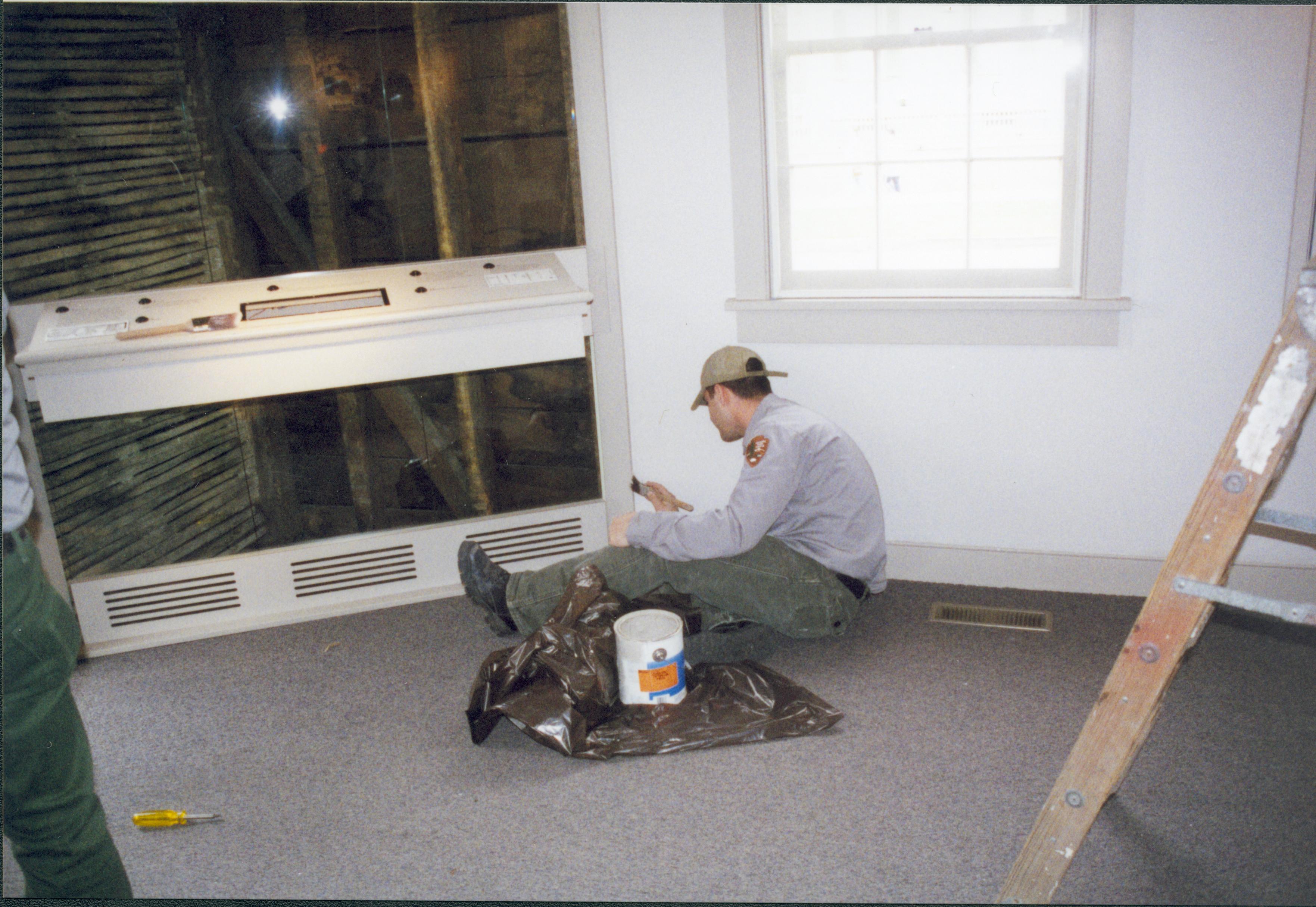 Marcus working LIHO NHS- Arnold House Exhibit, Roll 2001-2, exp 22 Arnold House, exhibit