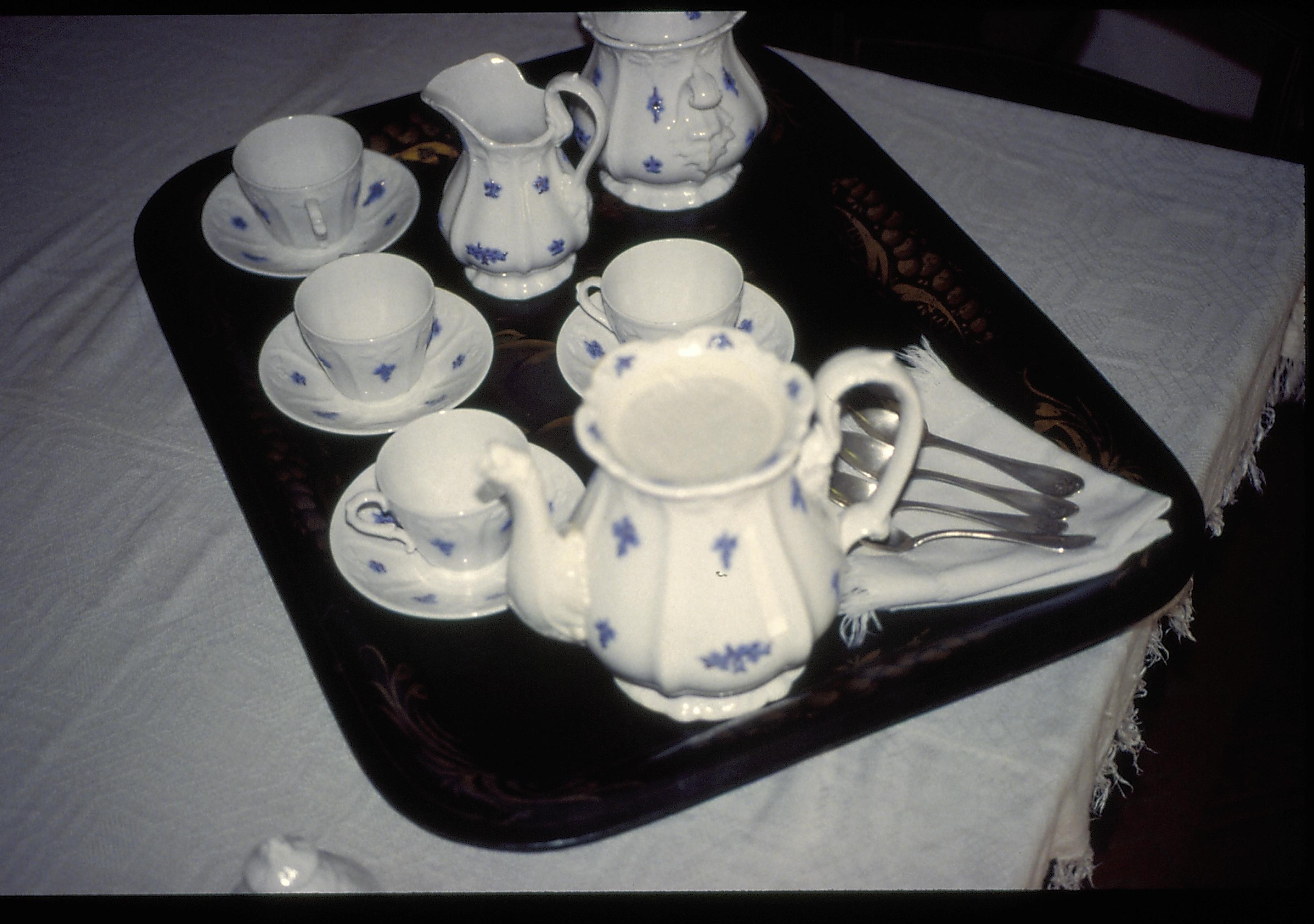 Cups, saucers, pitcher and spoons on table in dining room. Lincoln Home NHS- Christmas in Lincoln Home 1997, HS-20 Film Roll #17 Christmas, decorations