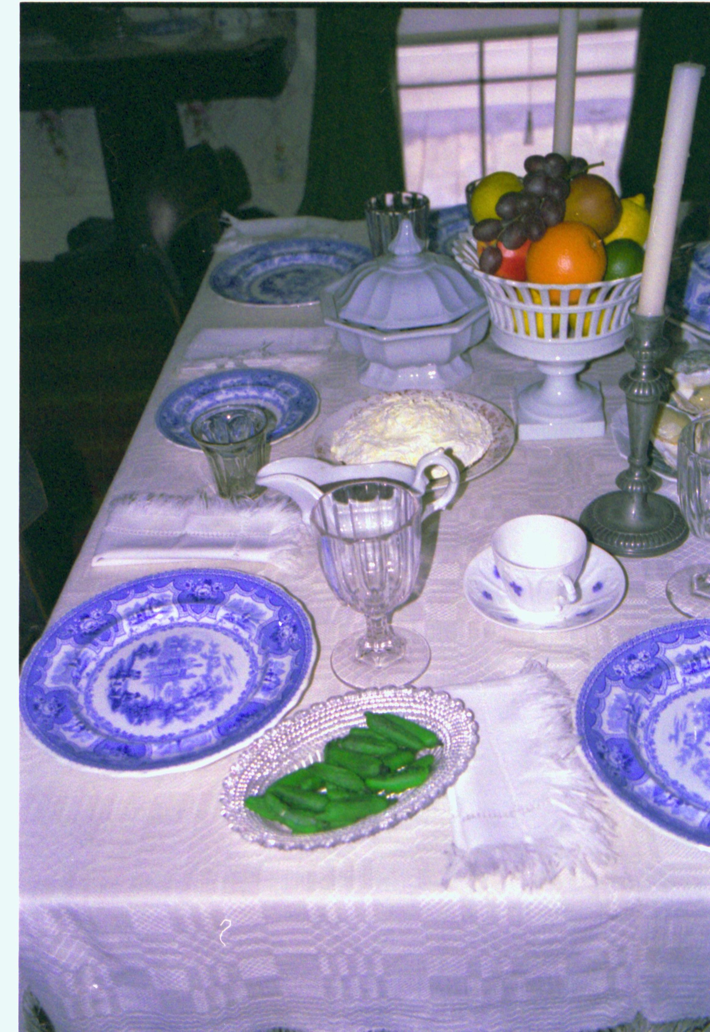 Table set with blue china. Holiday decorations Lincoln Home