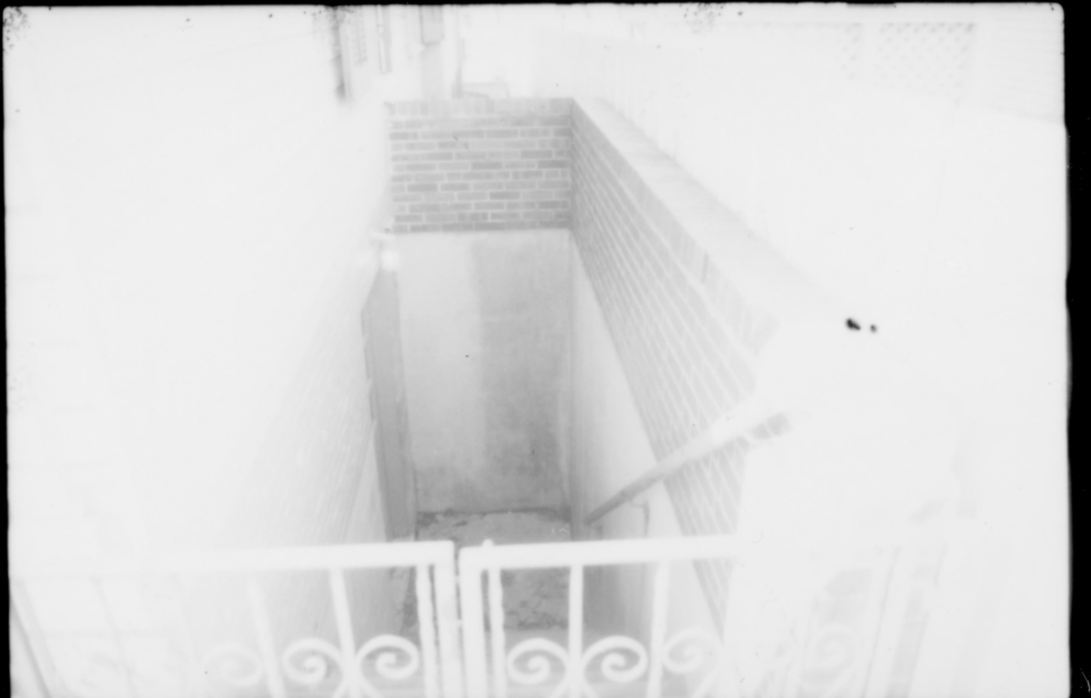 Basement stairwell on north side of Lincoln Home, prior to stairwell demolition. Photographer facing west.