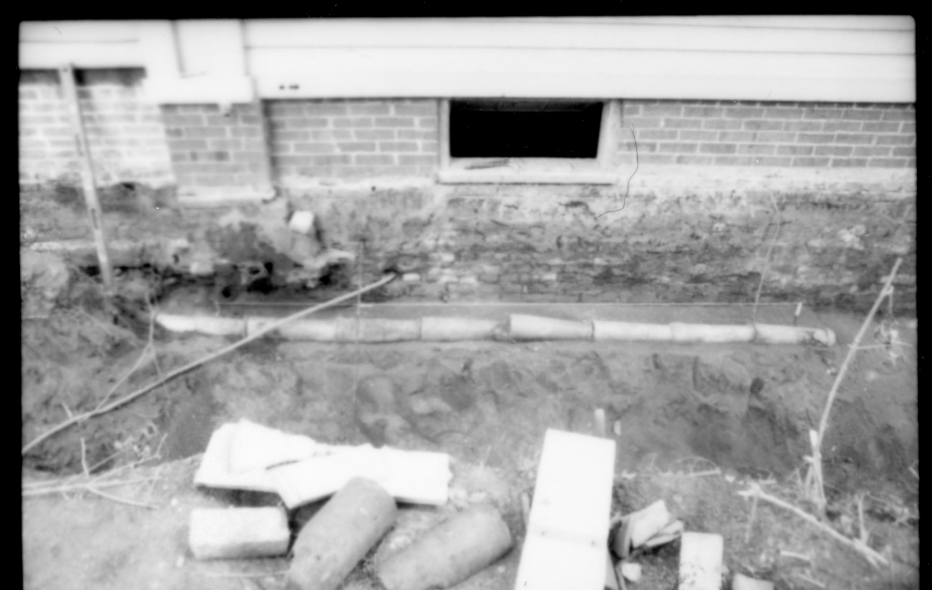 View of drain tiles along the foundation of the LIncoln Home.