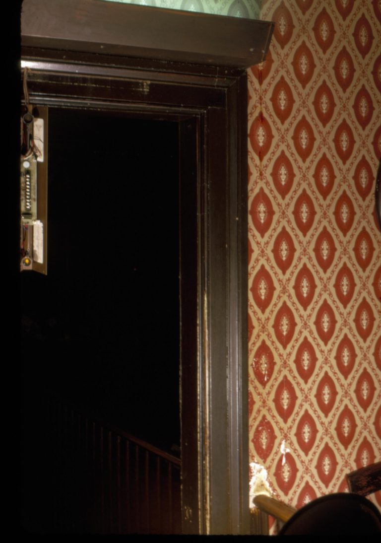 Dining Room door frame leading into the Rear Parlor, prior to the 1987-1988 Restoration. Photographer facing north.