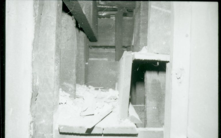 Photo of original steps between front hall stairwell and back (east) section of attic prior of addition of 2nd floor. Photographer facing north.