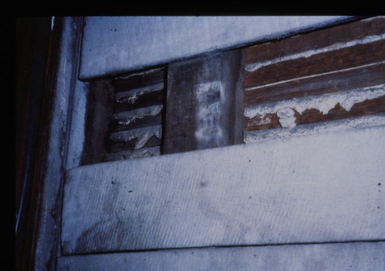 Siding, structure, lath, and plaster of Lincoln Home interior wall, as exposed during 1987-1988 Restoration. Exact location unknown.