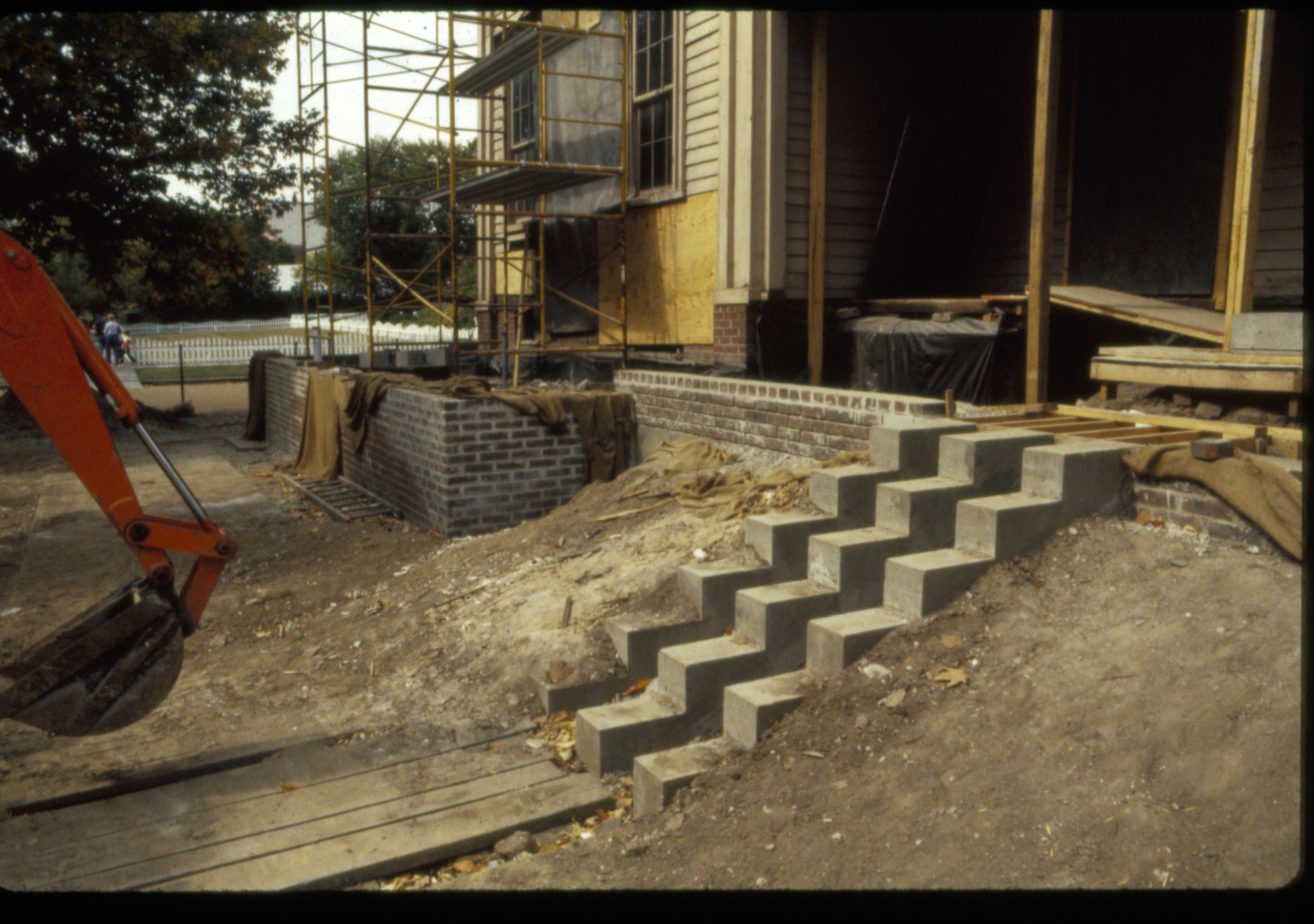 Work on the south facing, porch, and yard of the Lincoln Home, during the 1987-88 restoration. Photographer facing north west.