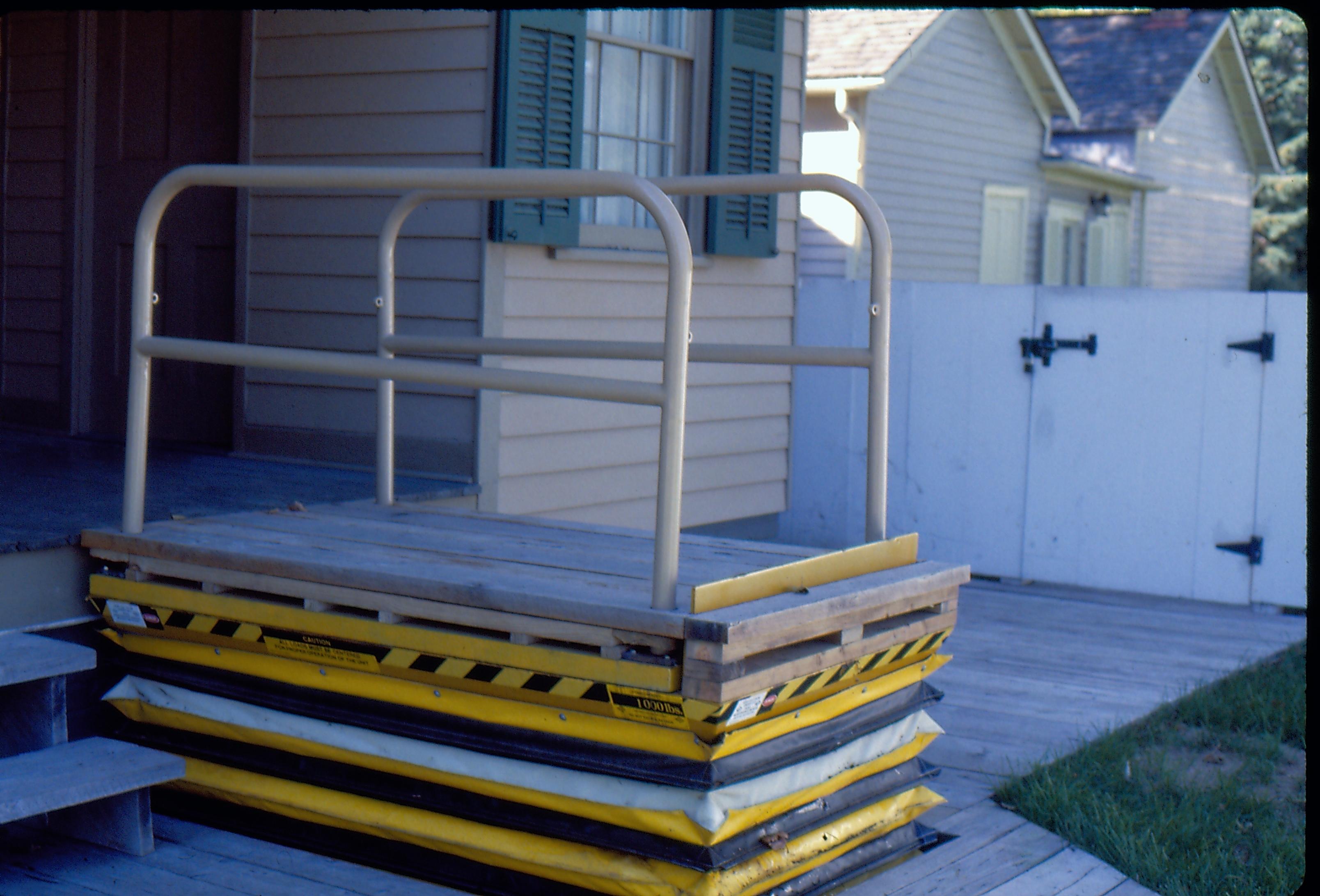 Lincoln Home wheelchair lift at full height. Photographer facing north west.