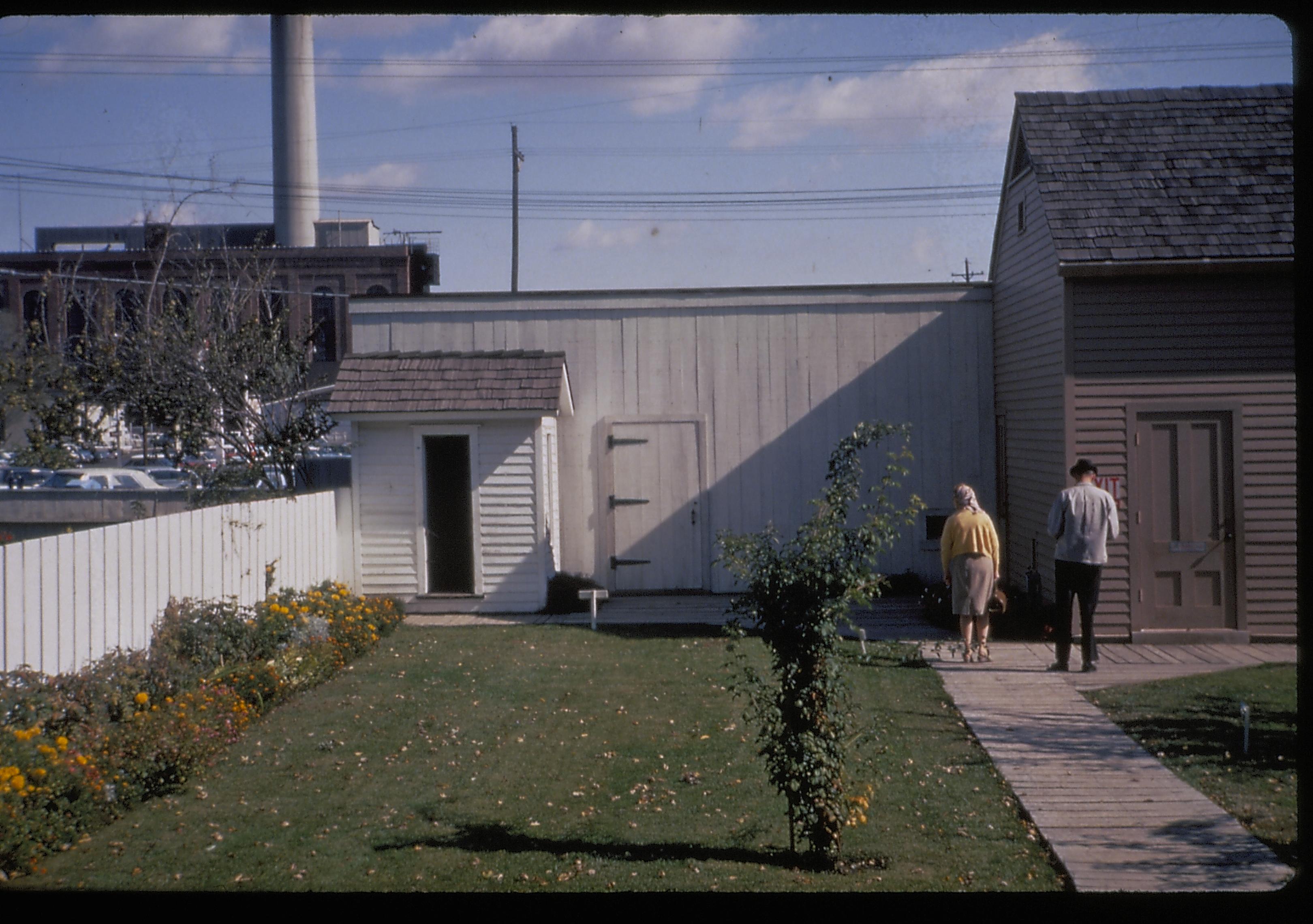 View of the Lincoln Home back yard, 1965, during the centennial of Lincoln's funeral. Photographer facing east.