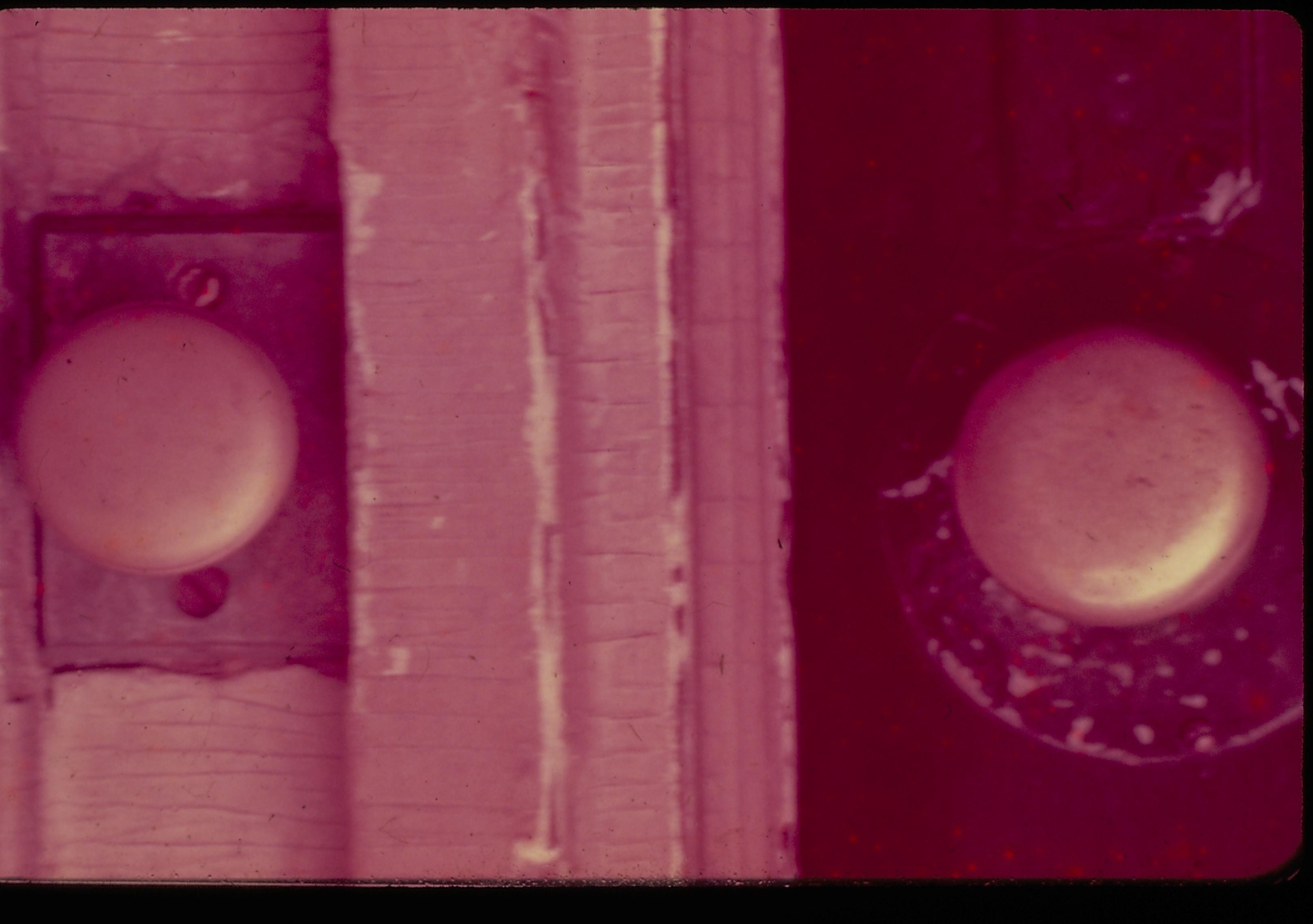 A close up view of the doorknob and door bell pull on the front (west) door of the Lincoln Home, pre-1955 State of Illinois restoration. Photographer facing east.
