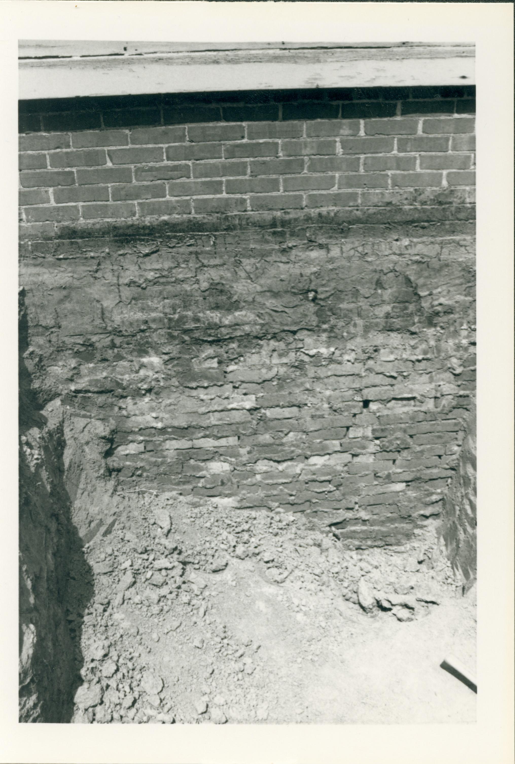 An exposed section of the Lincoln Home foundation.